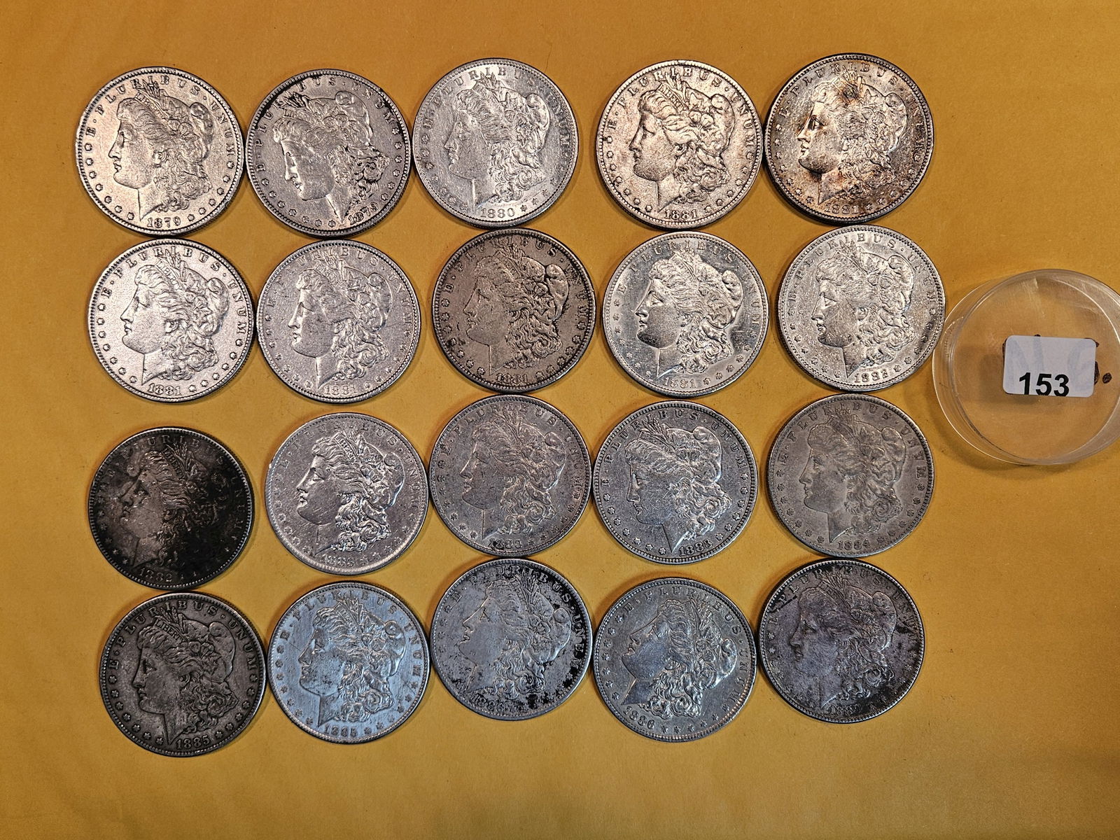 ** FULL ROLL ** Twenty Morgan Silver Dollars: All pre-1904. Grades from Very Fine through uncirculated - details
