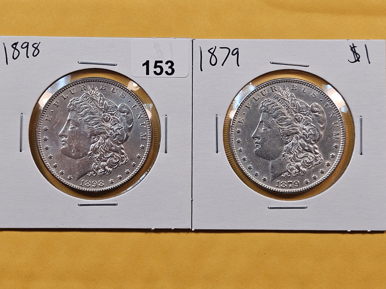 Two Brilliant About Uncirculated plus Morgan Silver Dollars (1 of 2)
