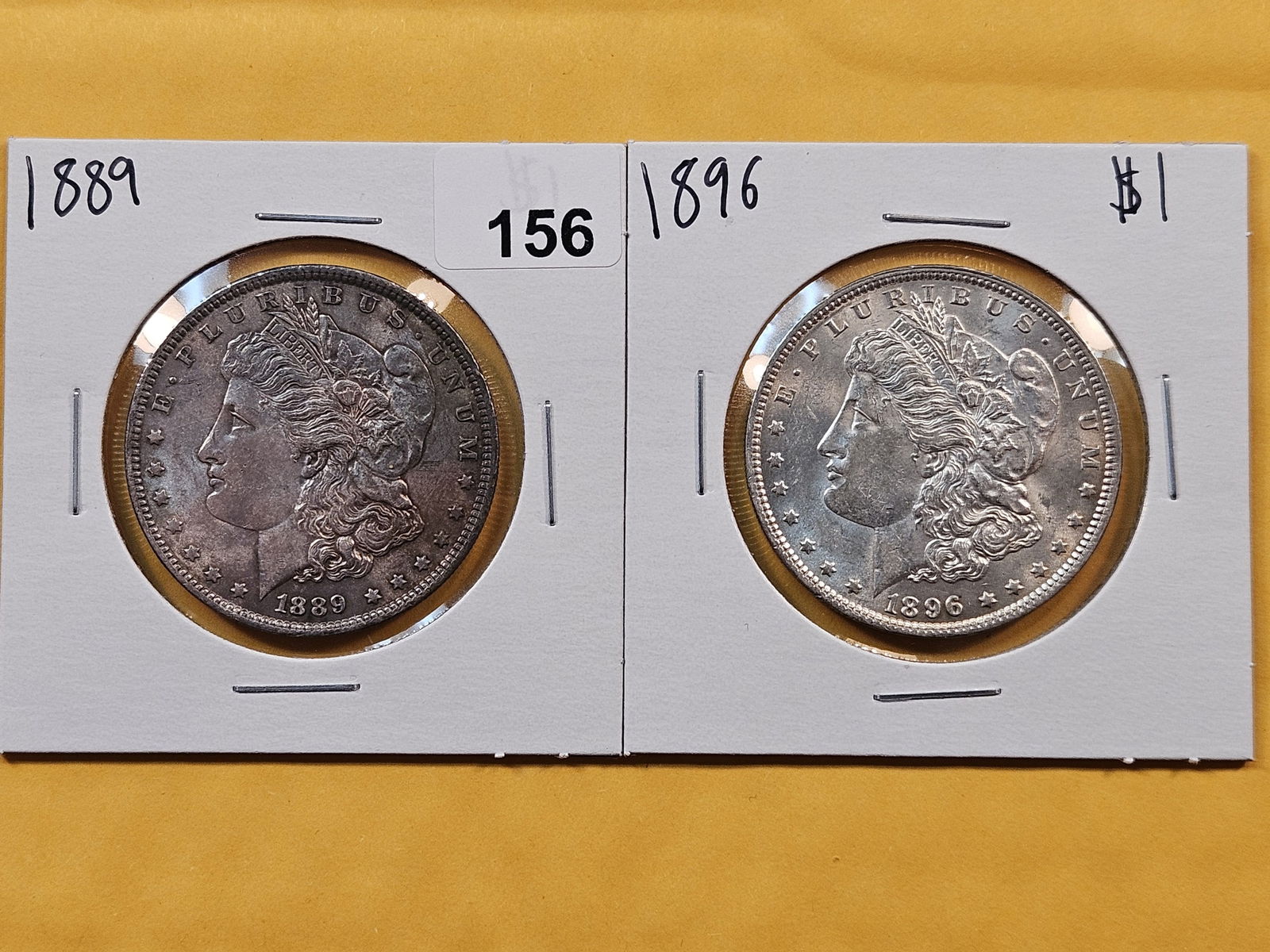 Two Brilliant About Uncirculated plus Morgan Silver Dollars (1 of 2)