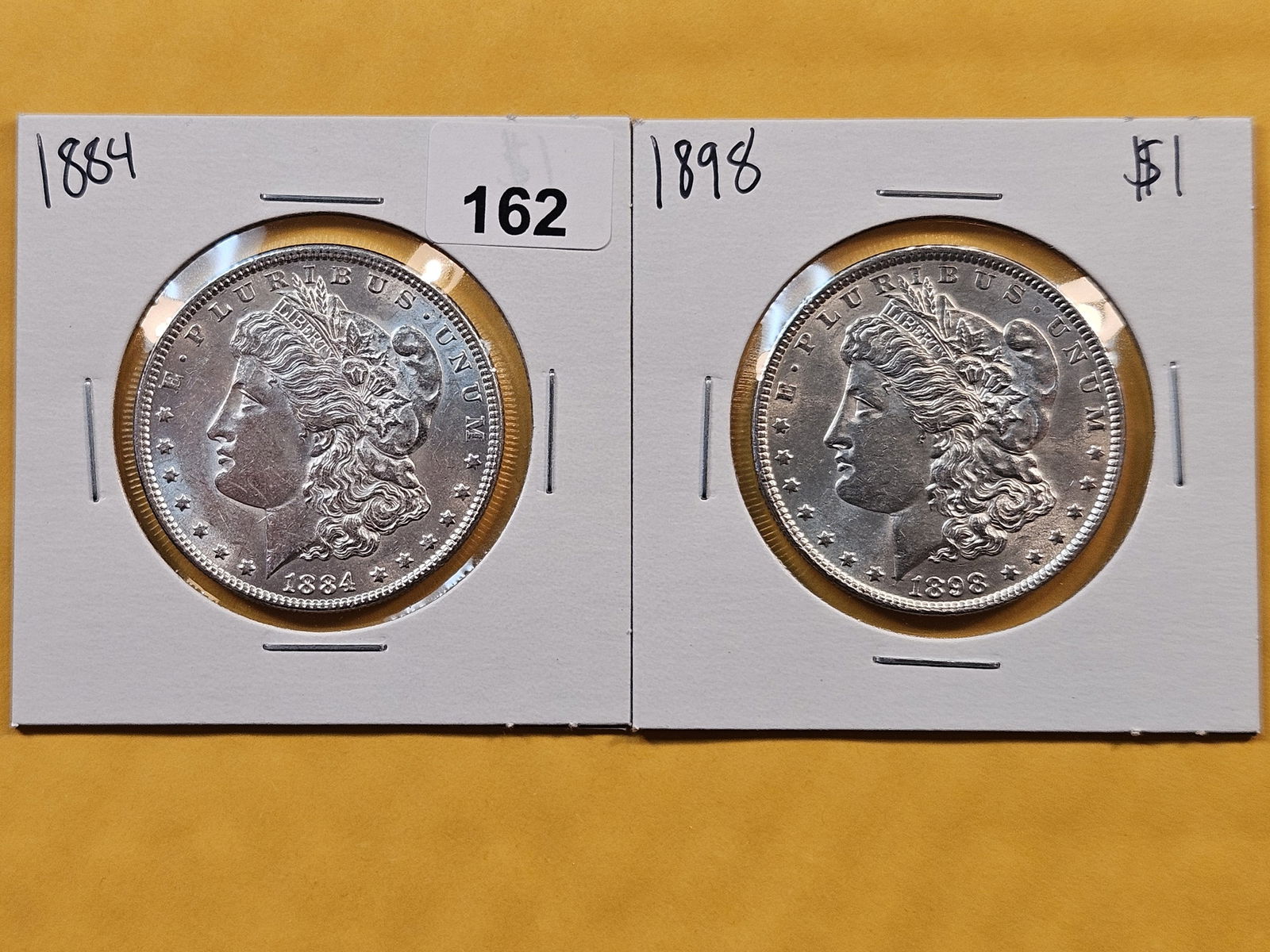 Two Brilliant About Uncirculated plus Morgan Silver Dollars (1 of 2)