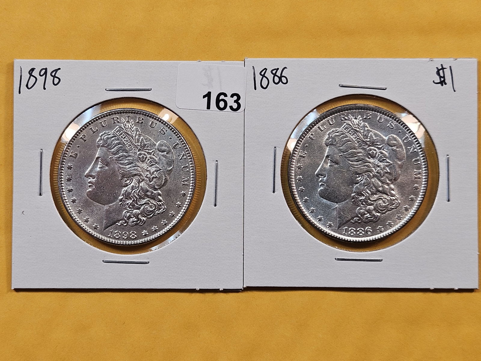 Two Brilliant About Uncirculated plus Morgan Silver Dollars (1 of 2)
