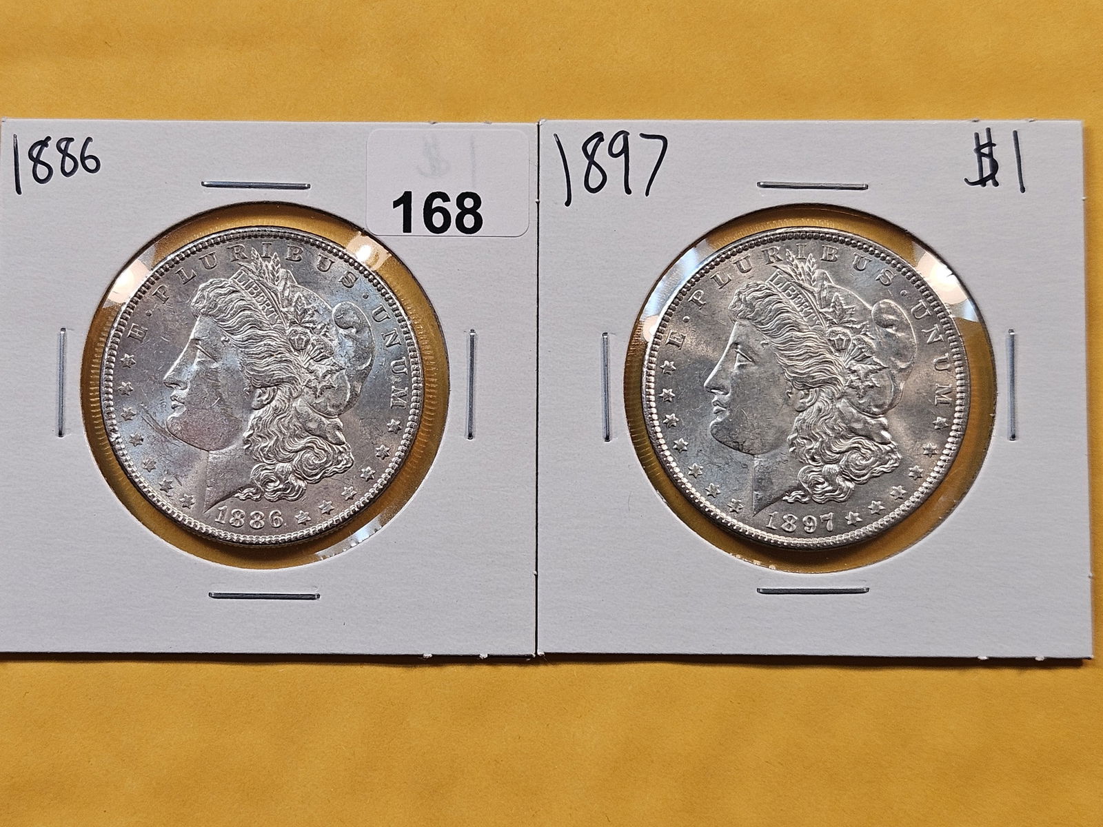 Two Brilliant About Uncirculated plus Morgan Silver Dollars (1 of 2)