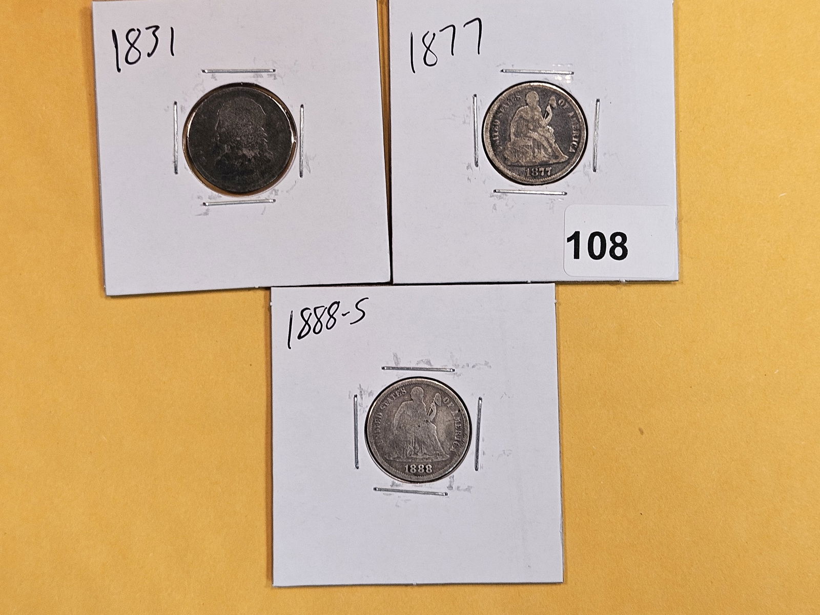 Three mixed silver dimes (1 of 4)