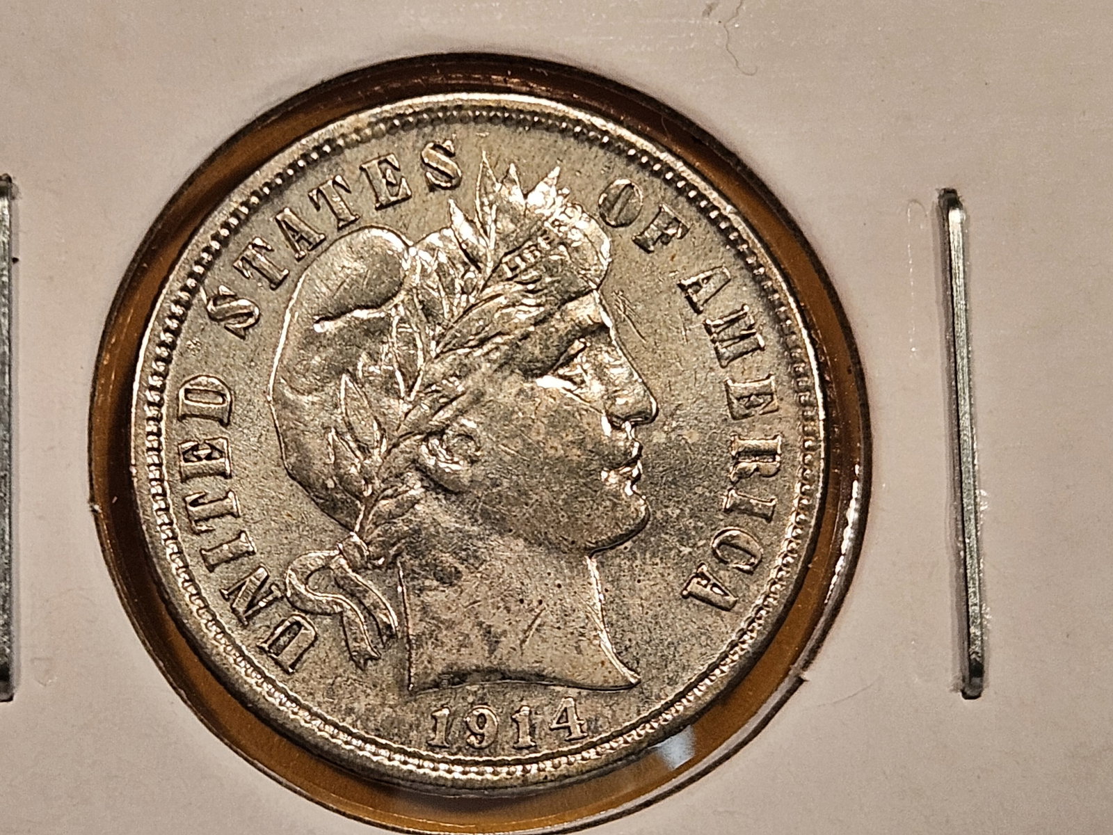 * Brilliant About Uncirculated Plus 1914-D Barber Dime: Light,older cleaning that has retoned