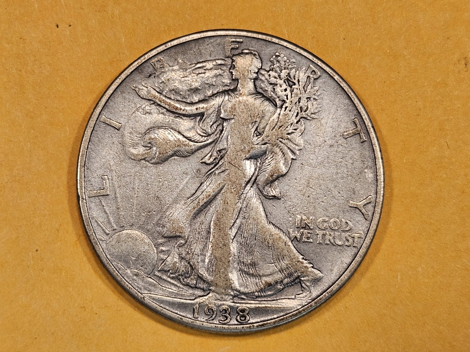 * KEY Date 1938-D Walking Liberty half Dollar: In Fine plus