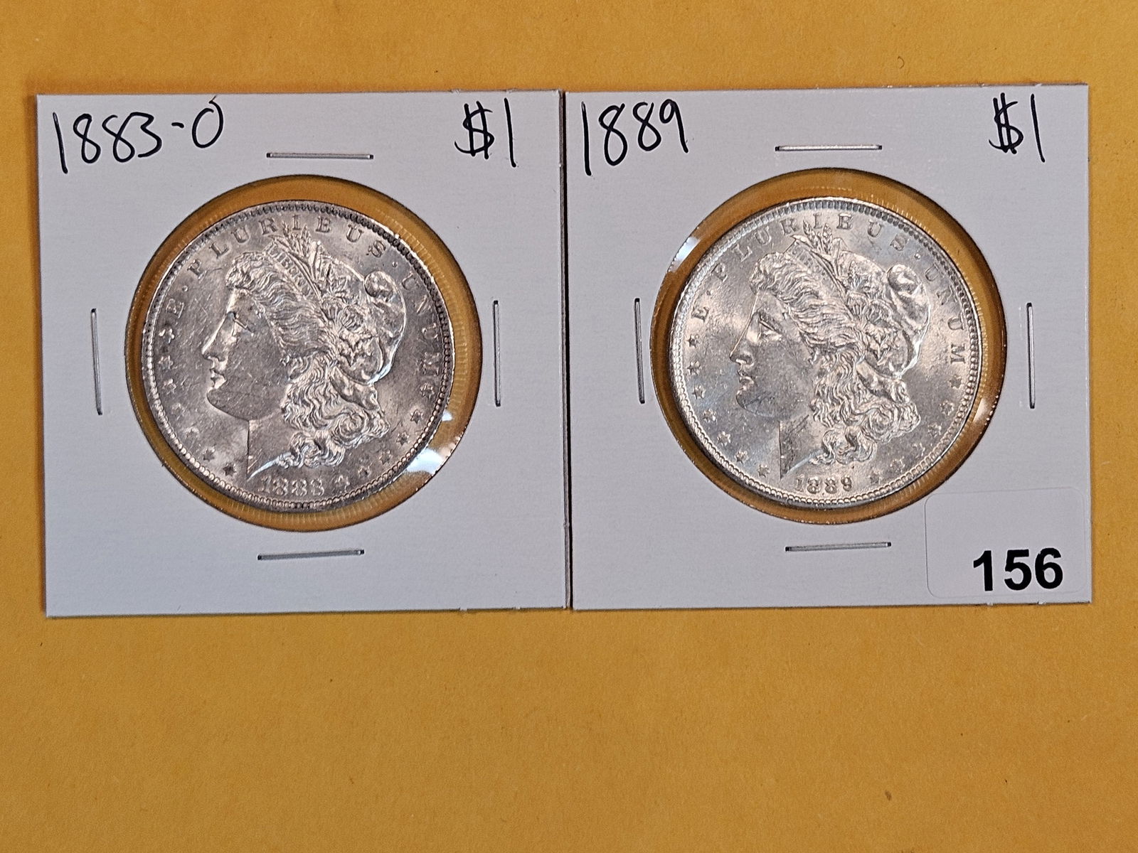 Two Brilliant About Uncirculated plus Morgan Silver Dollars (1 of 2)