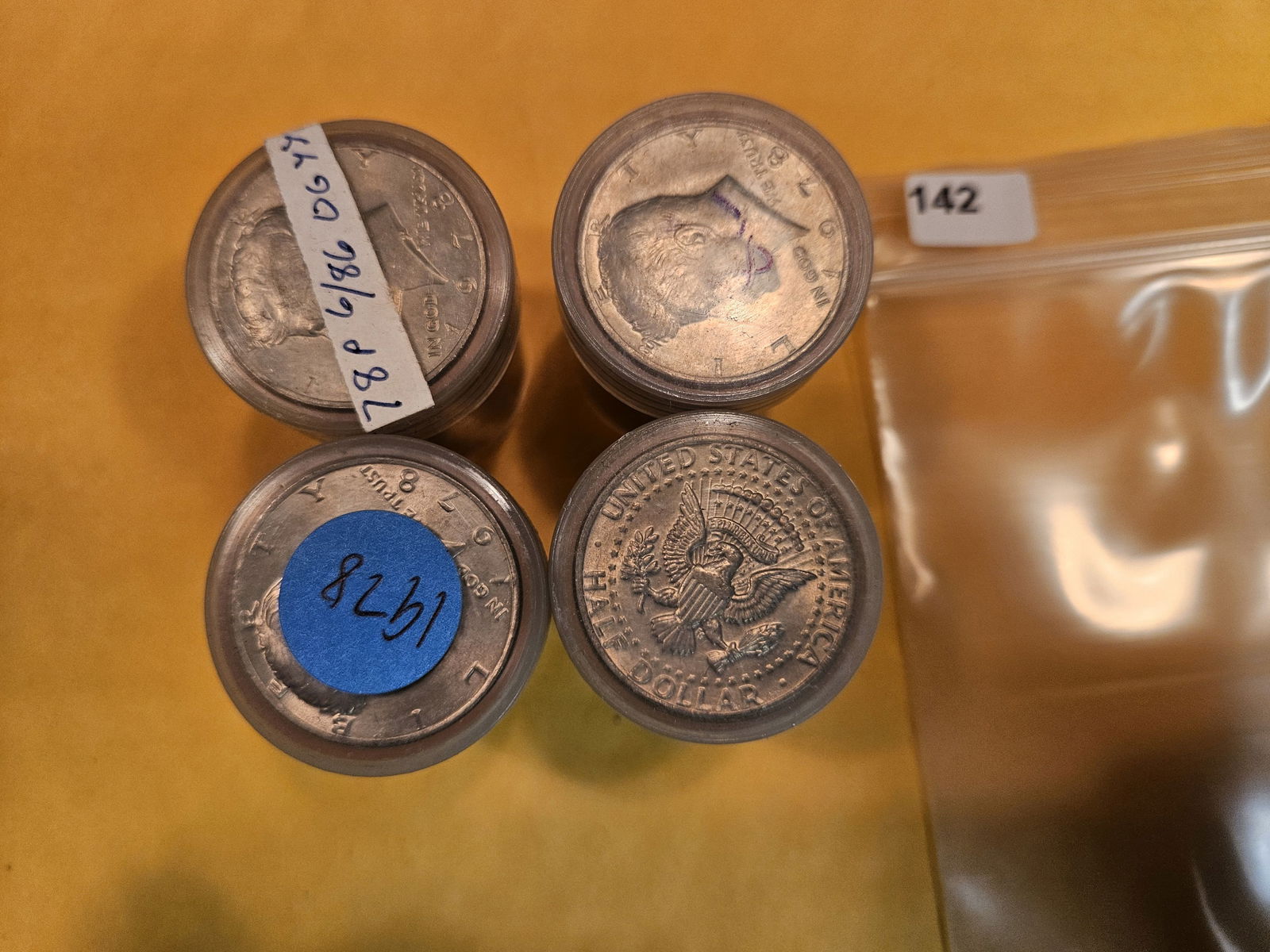 Four Brilliant Uncirculated rolls of Kennedy half Dollars (1 of 2)
