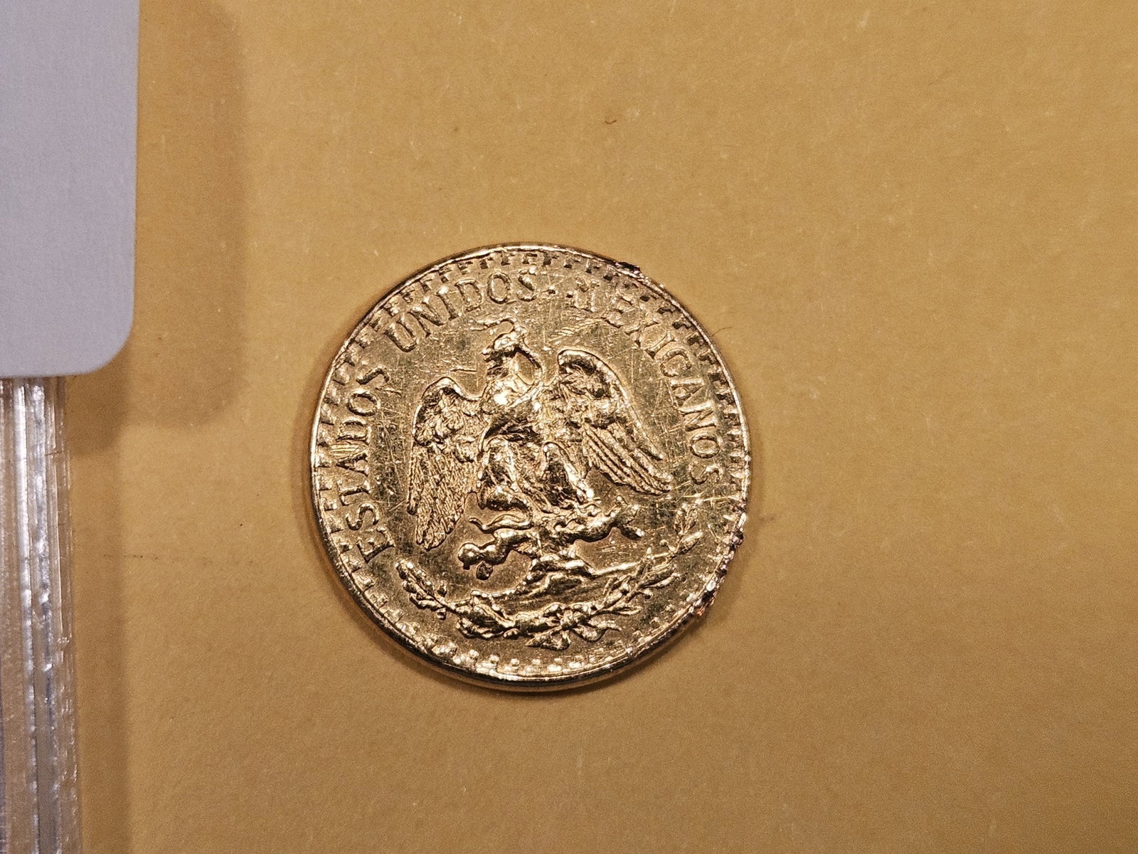 GOLD! Brilliant Uncirculated 1945 Gold Mexico 2 pesos: aye carumba!