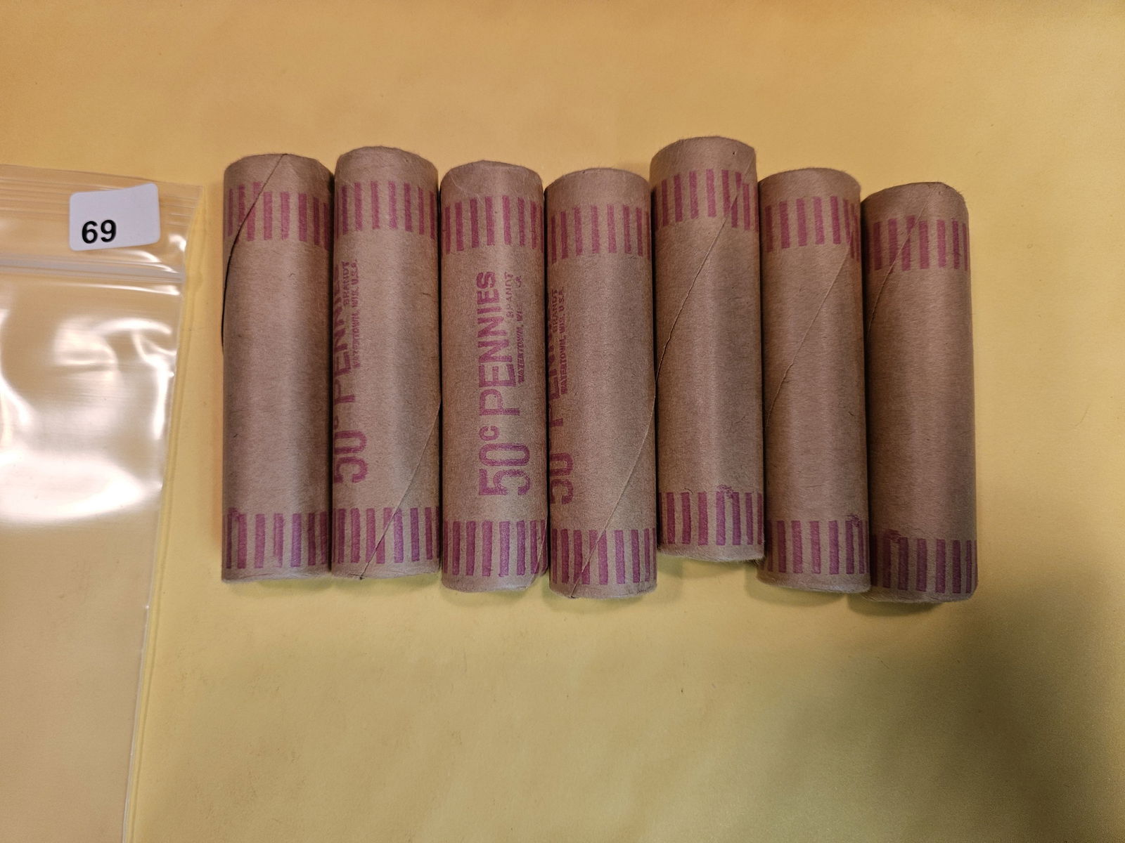 Seven rolls of wrapped Lincoln Cents (1 of 3)