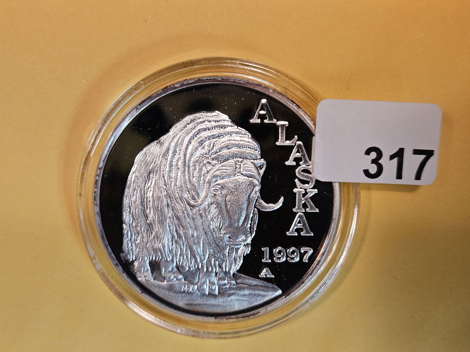 One Troy ounce .999 fine silver art Proof round (1 of 2)