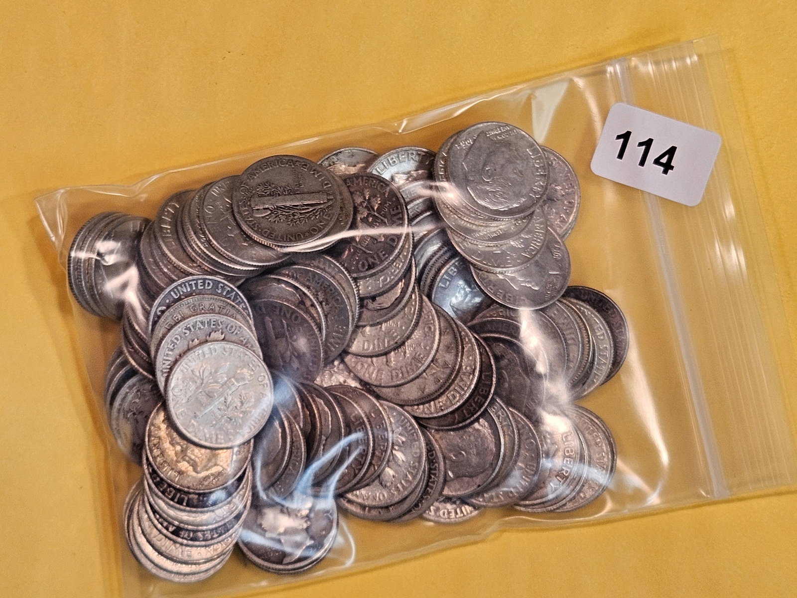 ONE HUNDRED mixed silver dimes (1 of 2)