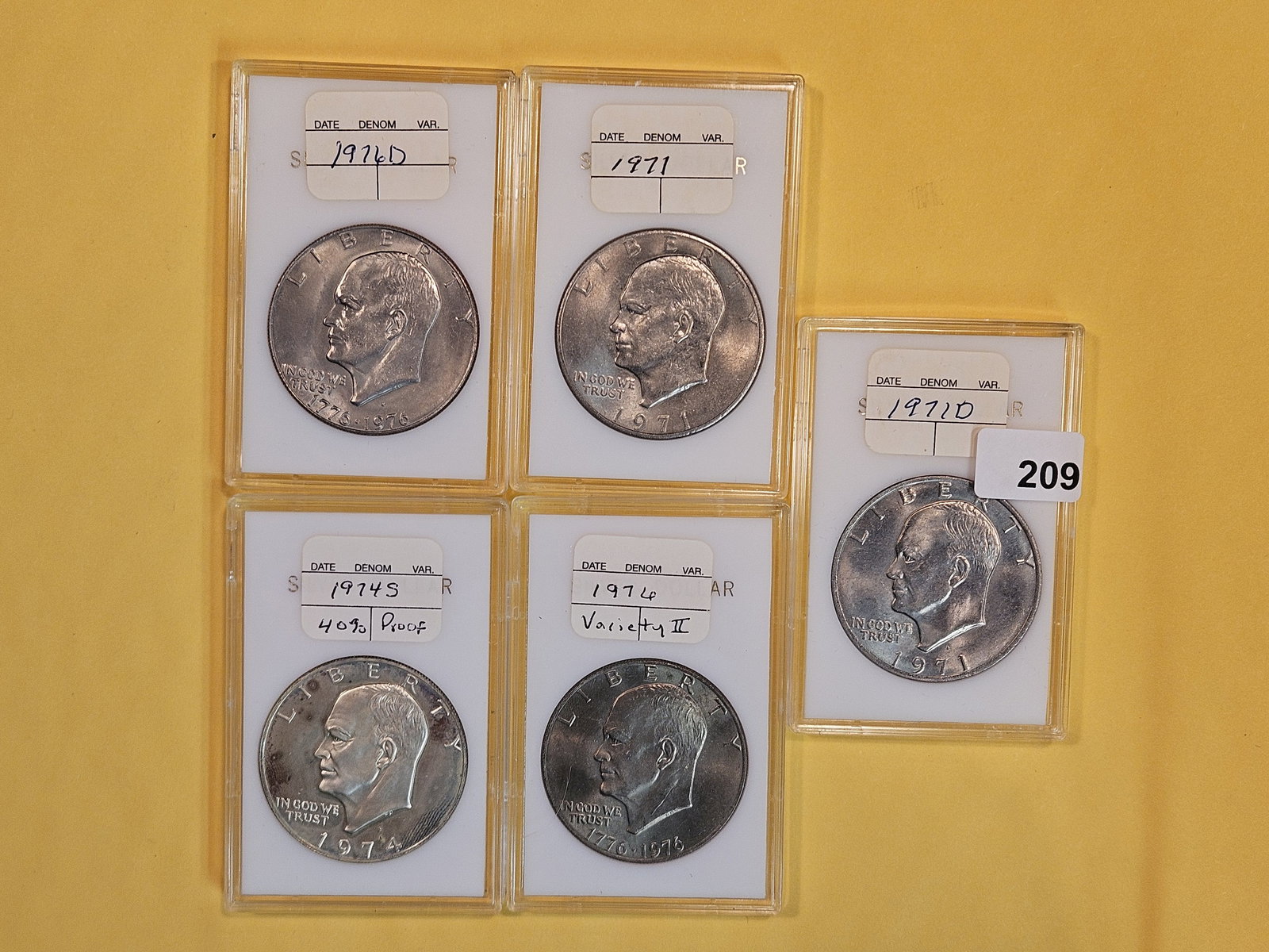 Five Brilliant Uncirculated or Proof Eisenhower Dollars (1 of 2)