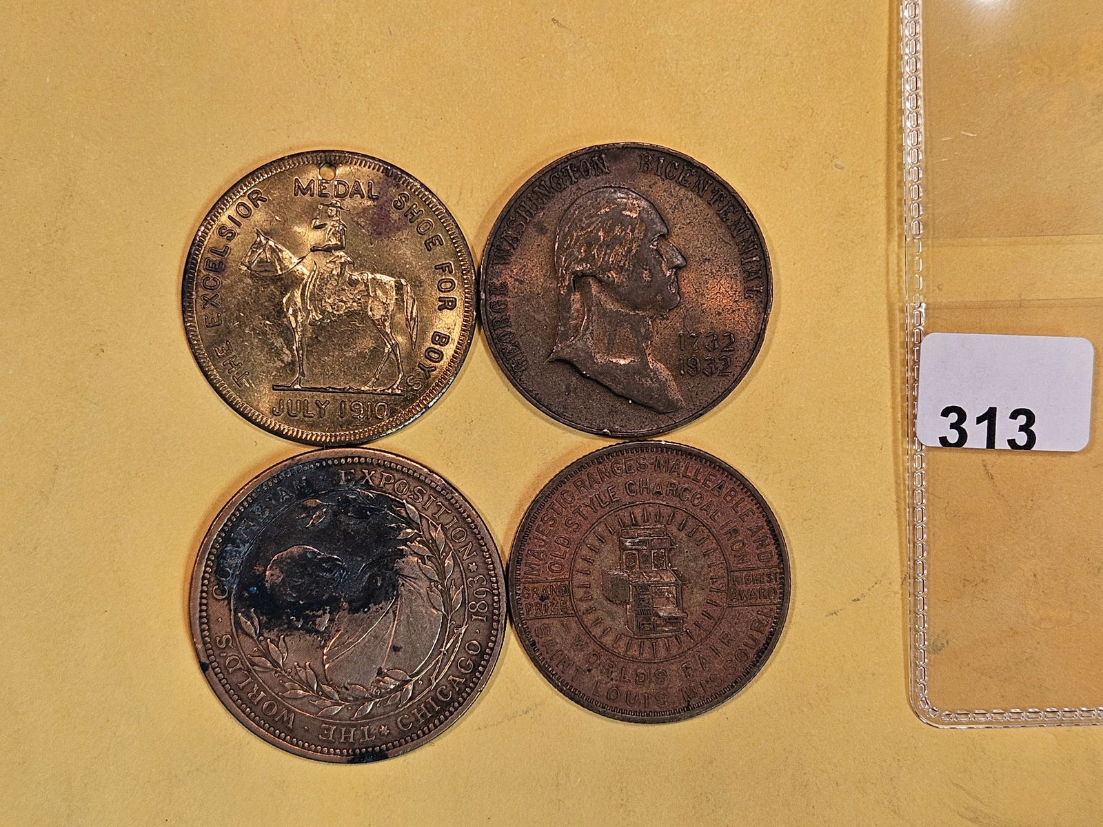 Four better so-called dollar and half-dollar medals (1 of 9)