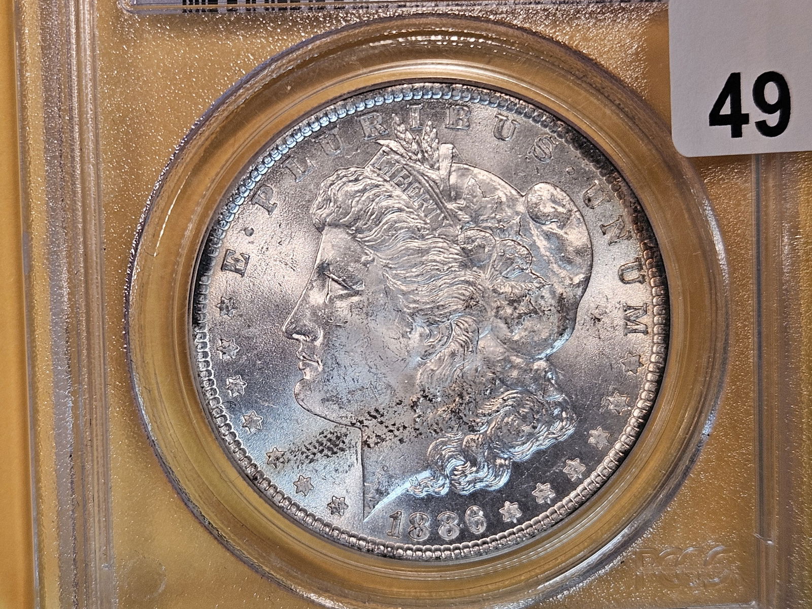 PCGS 1886 Morgan Dollar in Mint State 63 (1 of 3)
