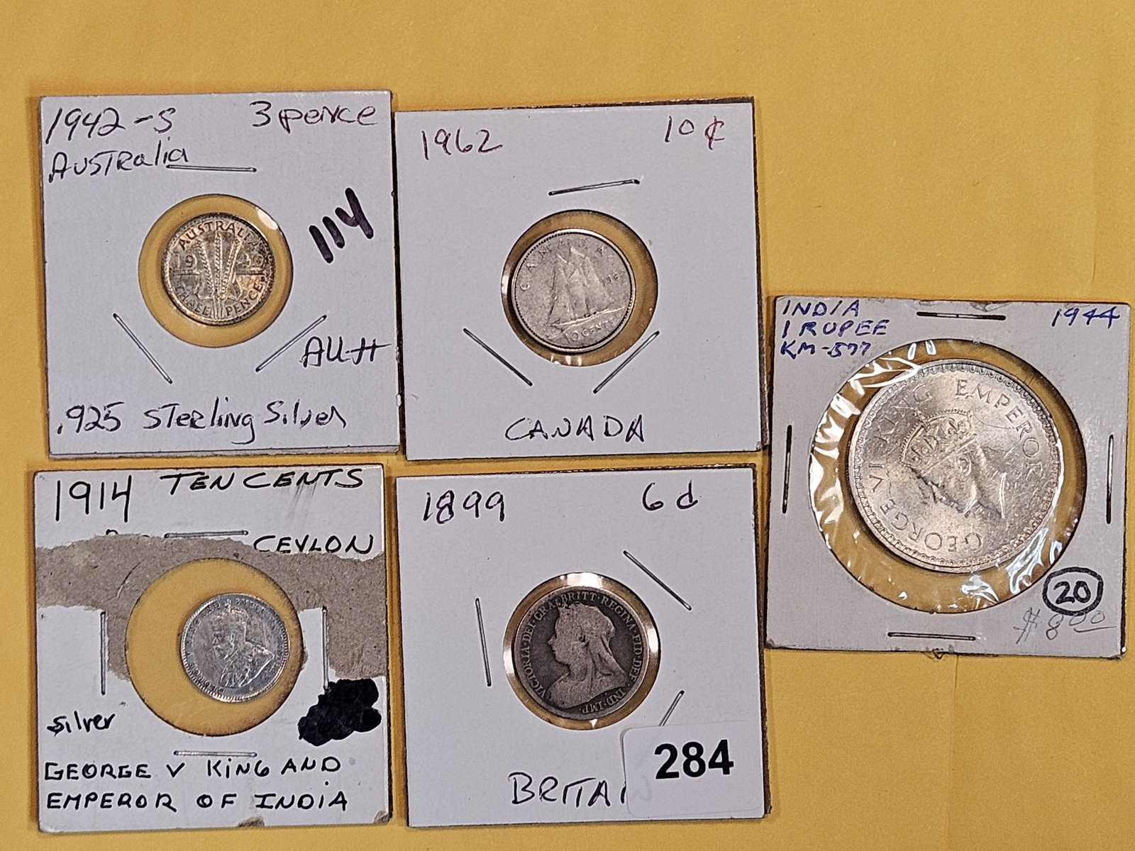 Five mixed, silver, World coins (1 of 2)