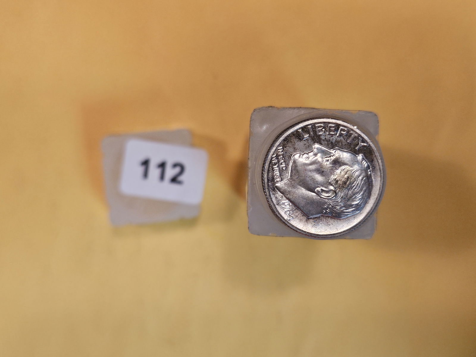 Full Roll of Silver Dimes: Top couple are Proof 1960's. Didn't search the rest. Didn't count them. Roll is full to the top. Came from a dealer. You can tell they're silver from the sides. Happy hunting.