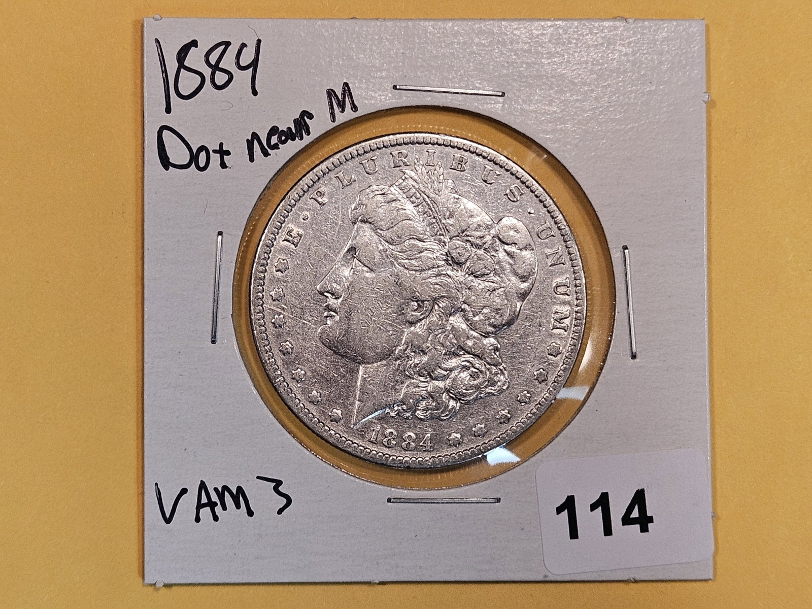 VARIETY! 1884 DOT Morgan Dollar: Scarce DOT near the M designers initials at the bottom of the bust. Looks like VAM 3
