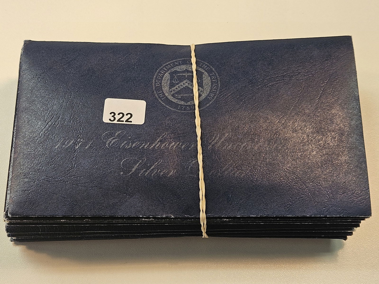 Ten Mixed Date Uncirculated Eisenhower Silver Dollars (1 of 4)