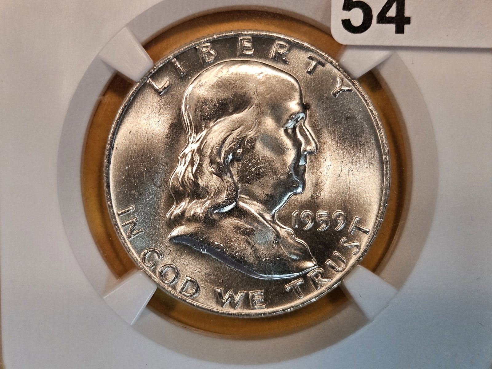 NGC 1959-D Franklin Half Dollar in Mint State 64 FBL: Full Bell Lines