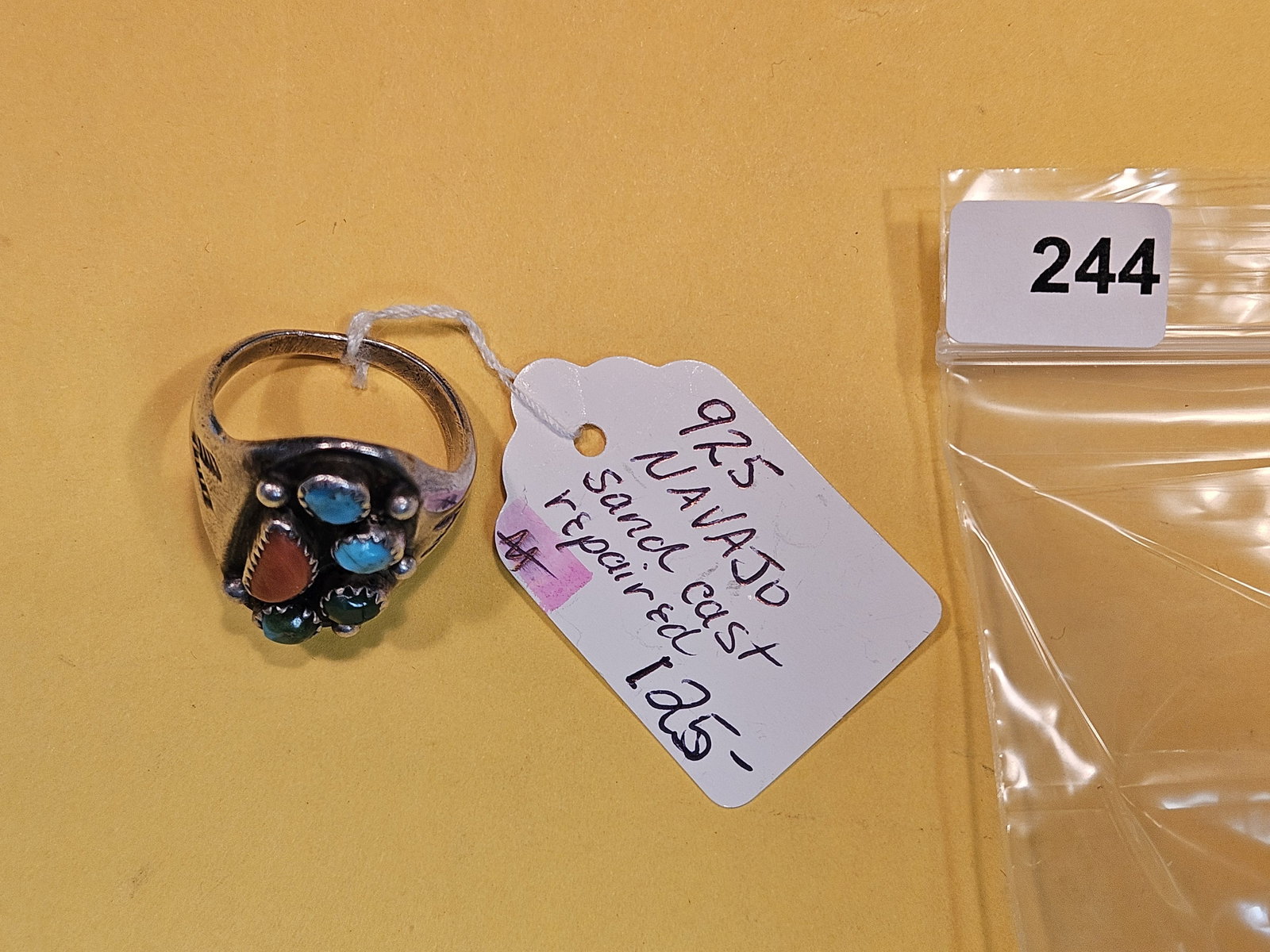 Signed, Hand-crafted Sterling Silver Native American ring: Navajo. Signed AL. Sand Cast