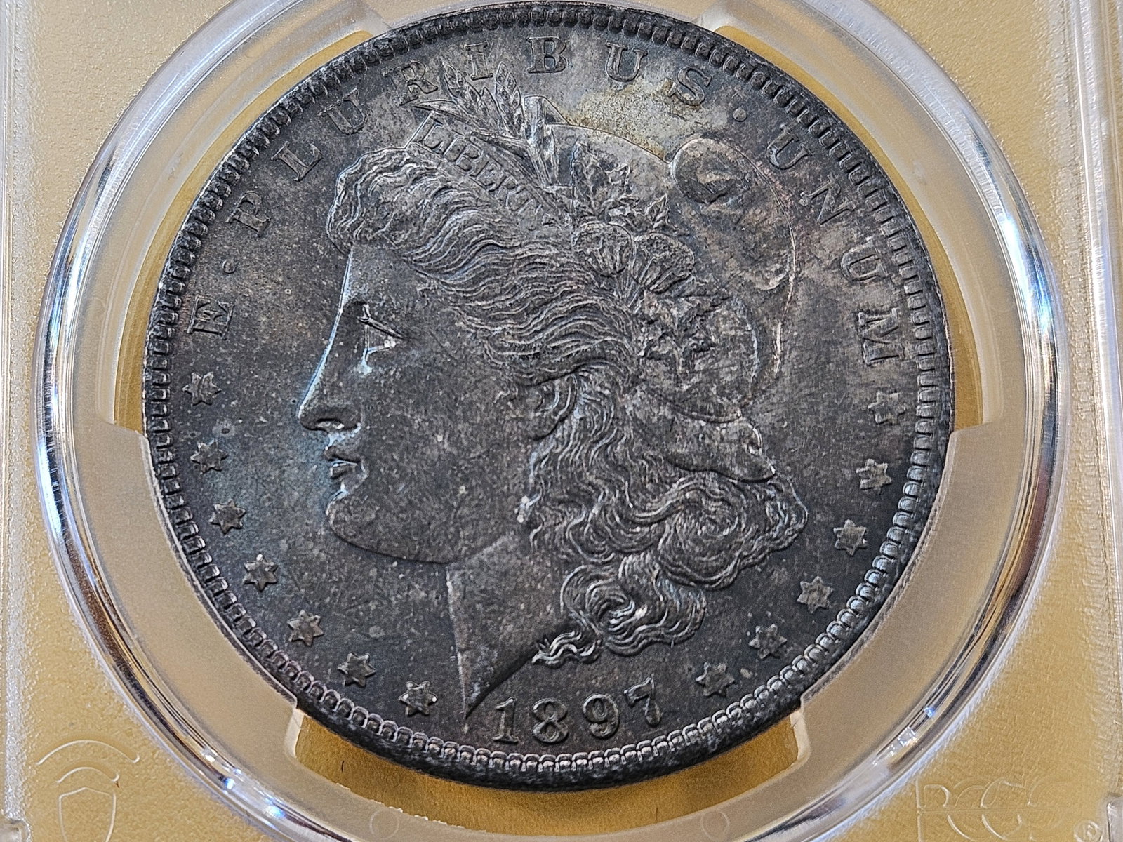 PCGS 1897 Morgan Silver Dollar in Mint State 63 (1 of 4)