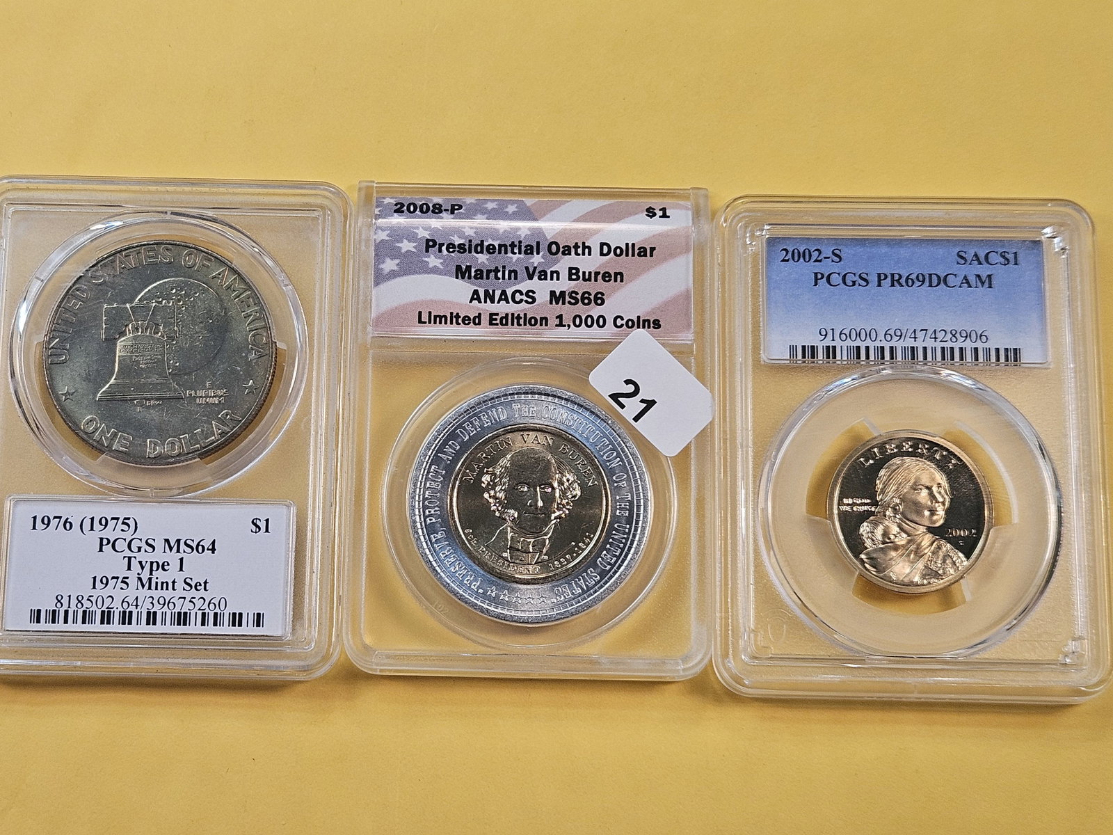 Three Graded US Dollars (1 of 8)
