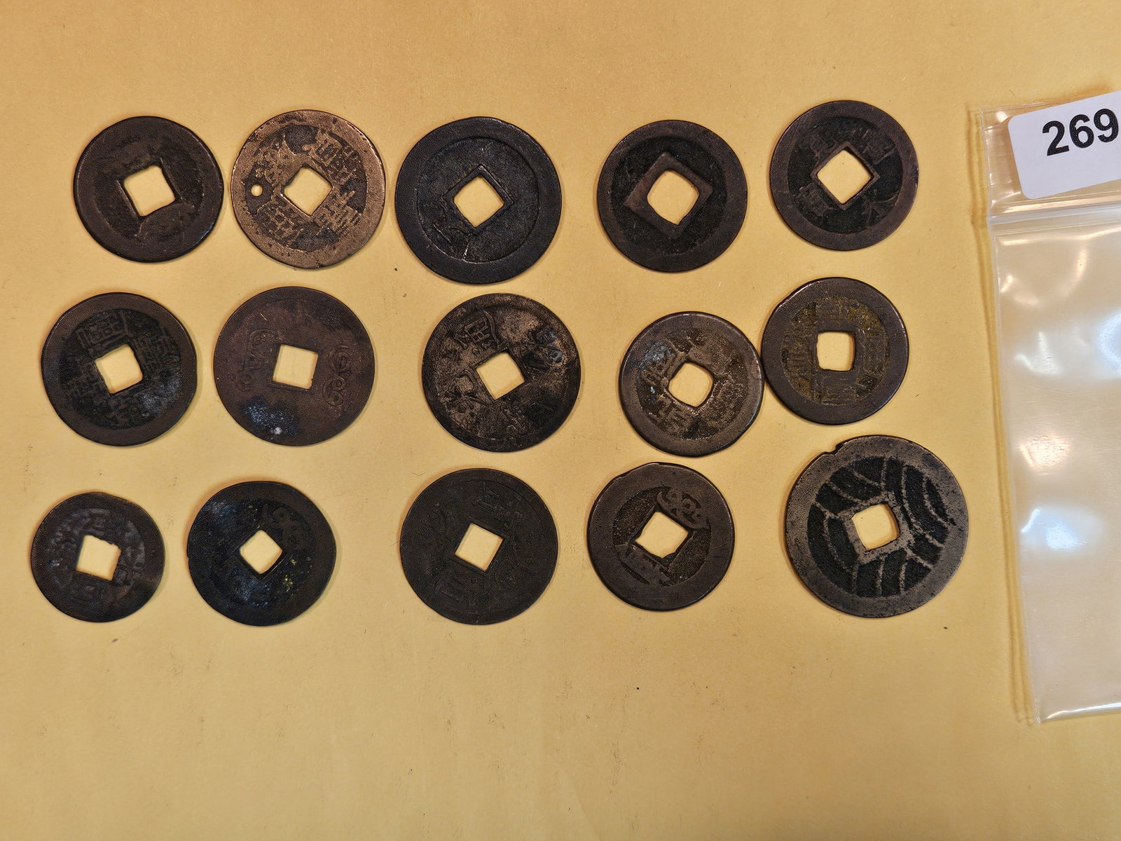 Fifteen mixed Asian coins (1 of 3)