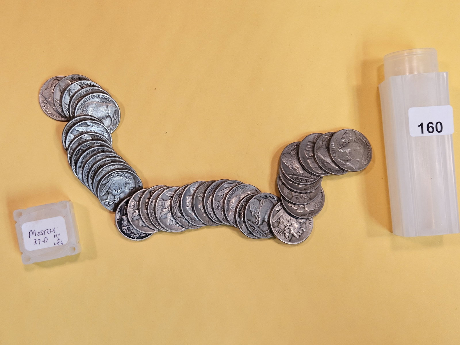 Mostly full roll of 1937-D Buffalo Nickels: From dealer. We didn't check, but just eyeballing them, they look in the very fine range