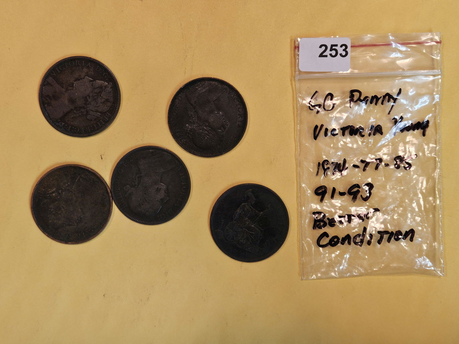 Five Great Britain copper pennies: 1874 through 1893