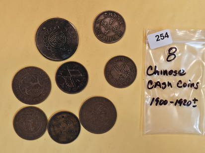 Eight mixed Chinese Cash coins: 1900 - 1920's