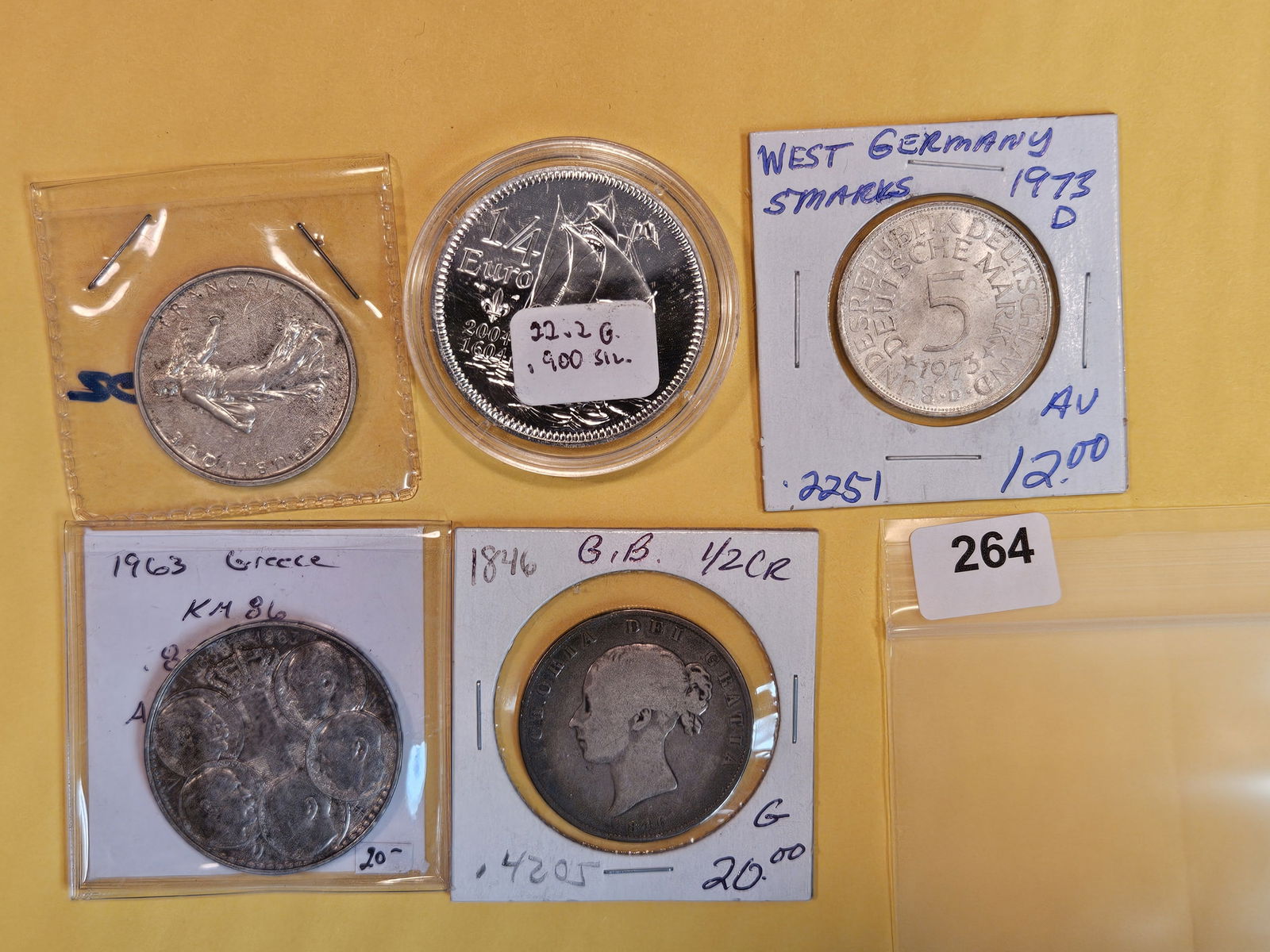 Five mixed Silver World coins (1 of 5)