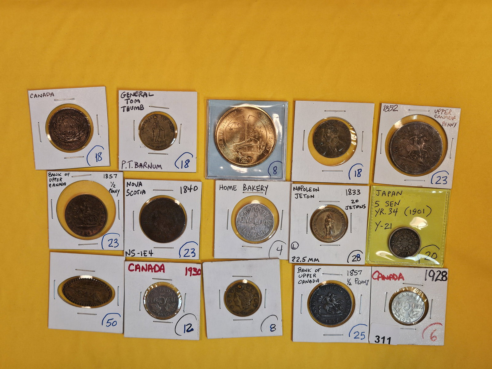 Fifteen mixed pieces of Exonumia and a couple World coins (1 of 7)