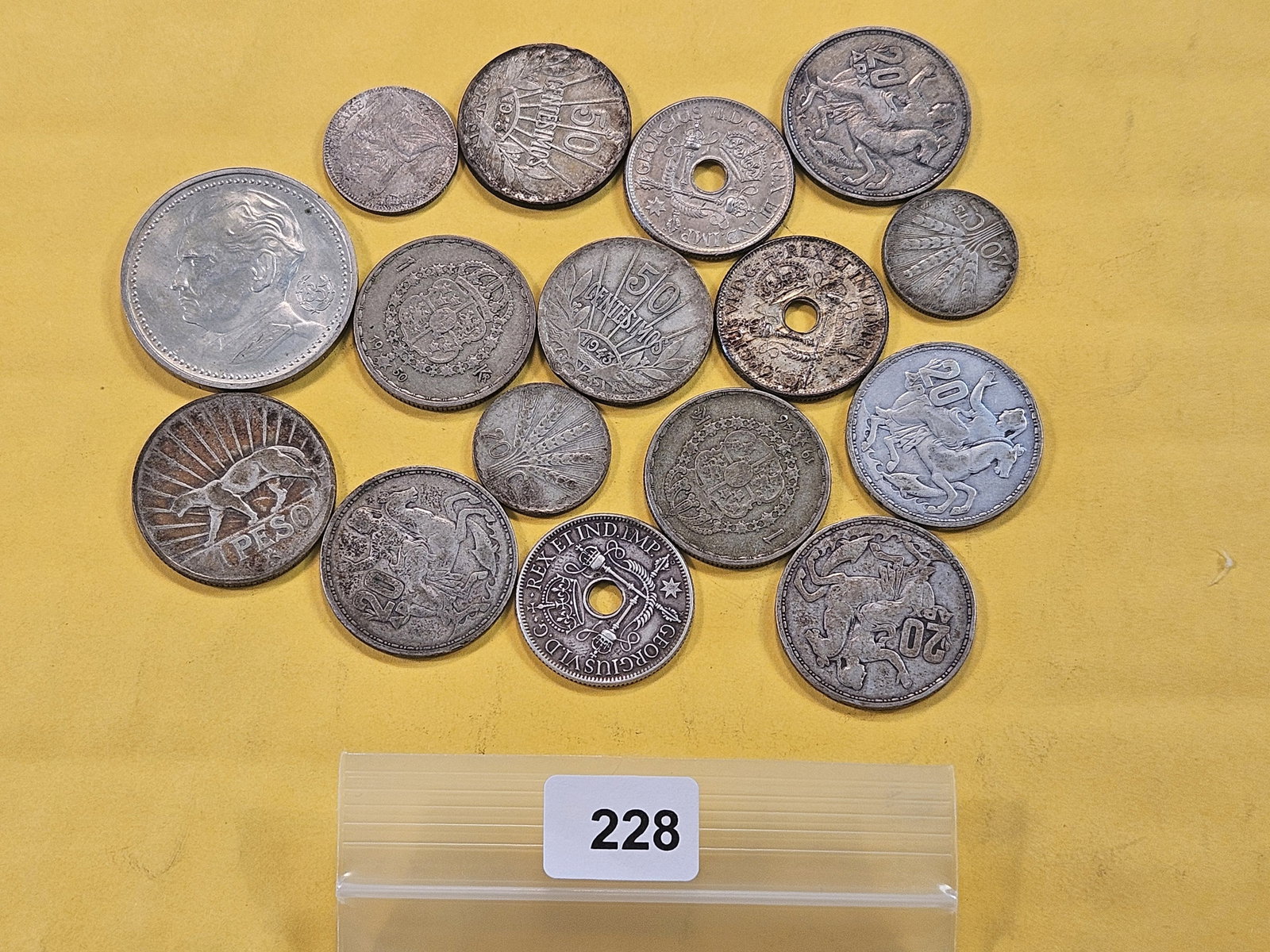 Sixteen Mixed World Silver Coins (1 of 5)