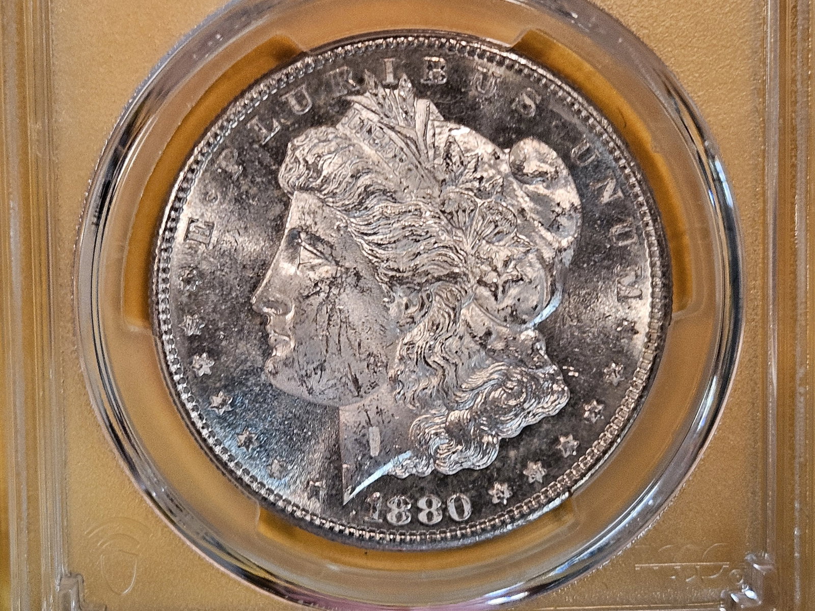 PCGS 1880-S Morgan Dollar in Mint State 62: Near Prooflike fields