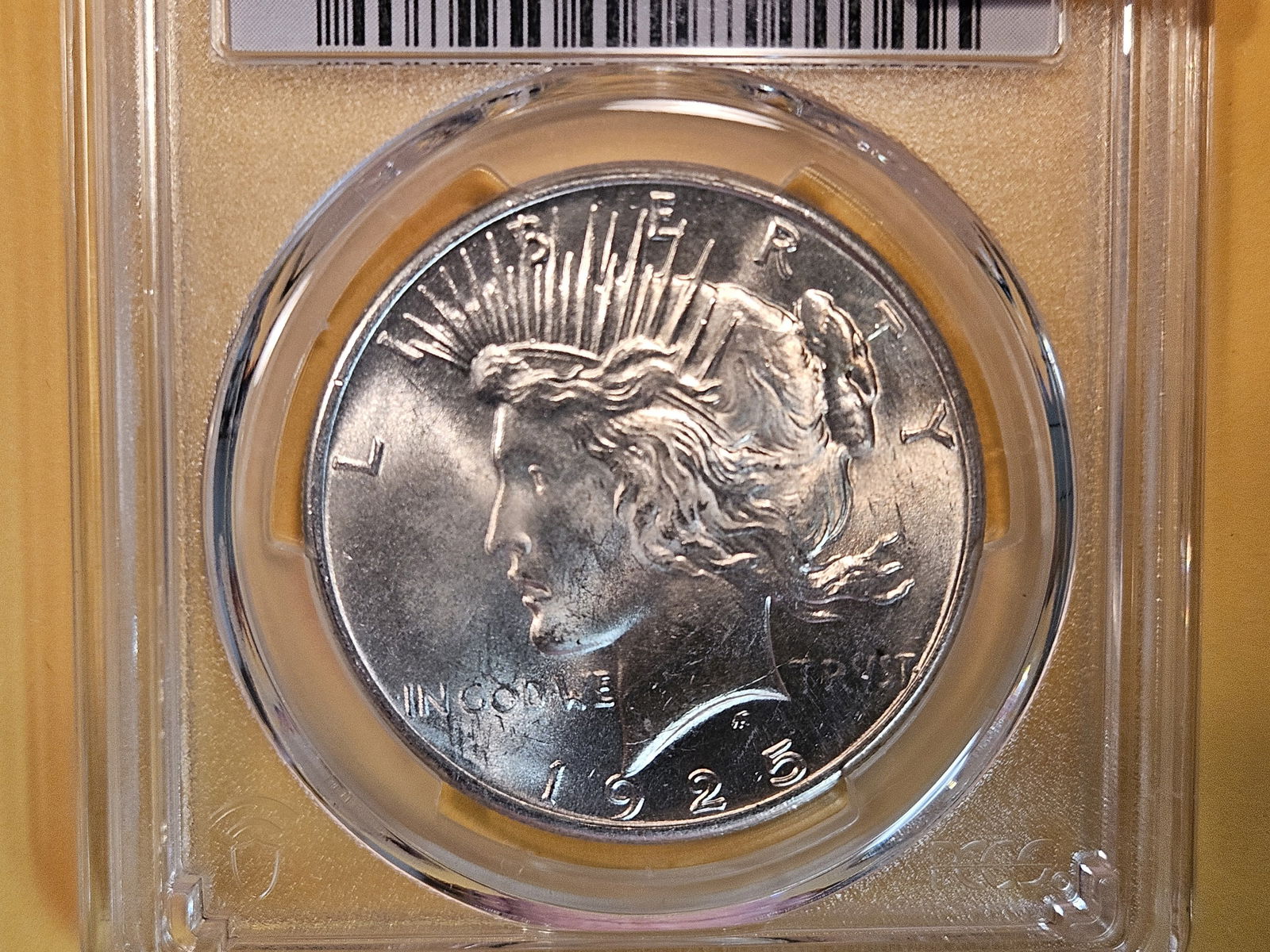 PCGS 1925 Peace Dollar in Mint State 62 (1 of 3)