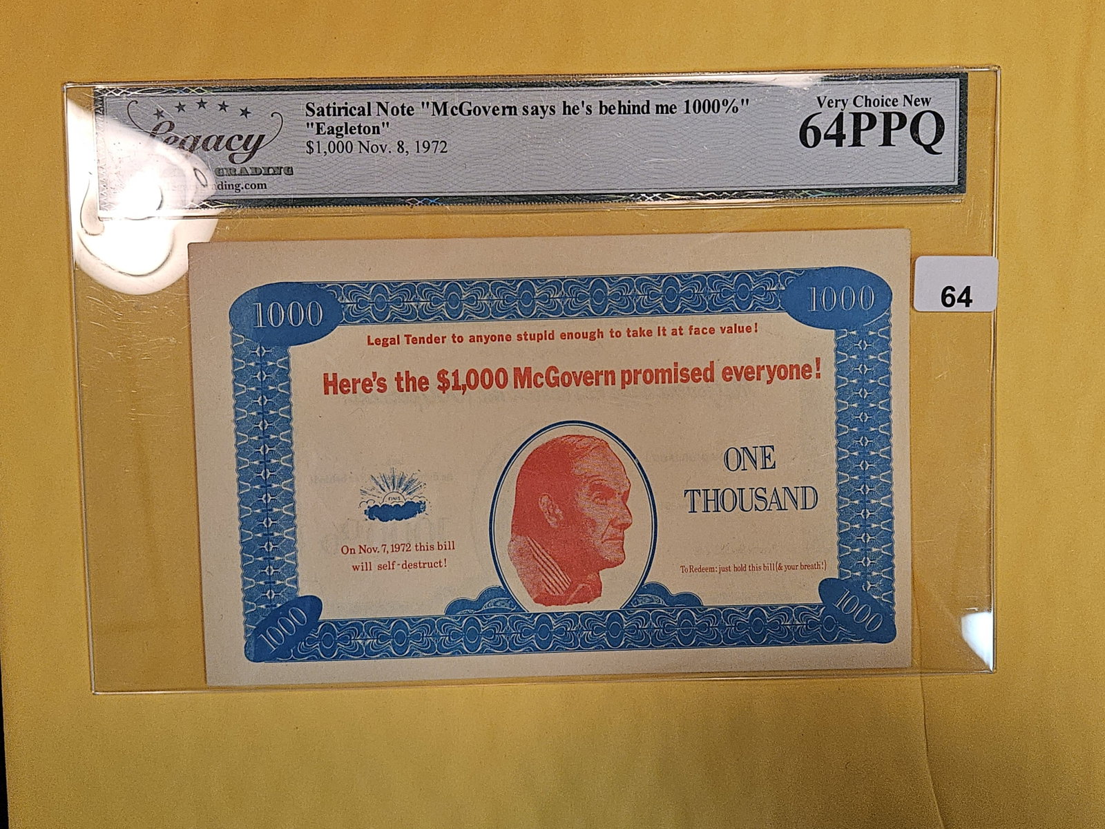 LEGACY Currency Grading 1972 Satirical McGovern $1,000 in Very Choice New 64 PPQ: Satirical Note. "McGovern says he's behind me 1000 Percent"