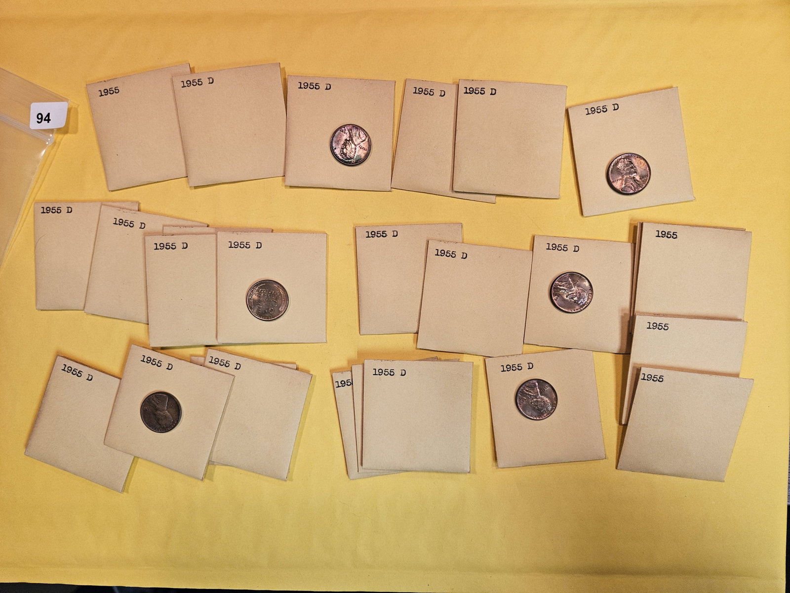 Twenty-five TONED wheat cents: All 1955 and 1955-D. We didn't look at all. From consignor. The ones we saw were BU Red to Red-Brown. All varying degrees of toning