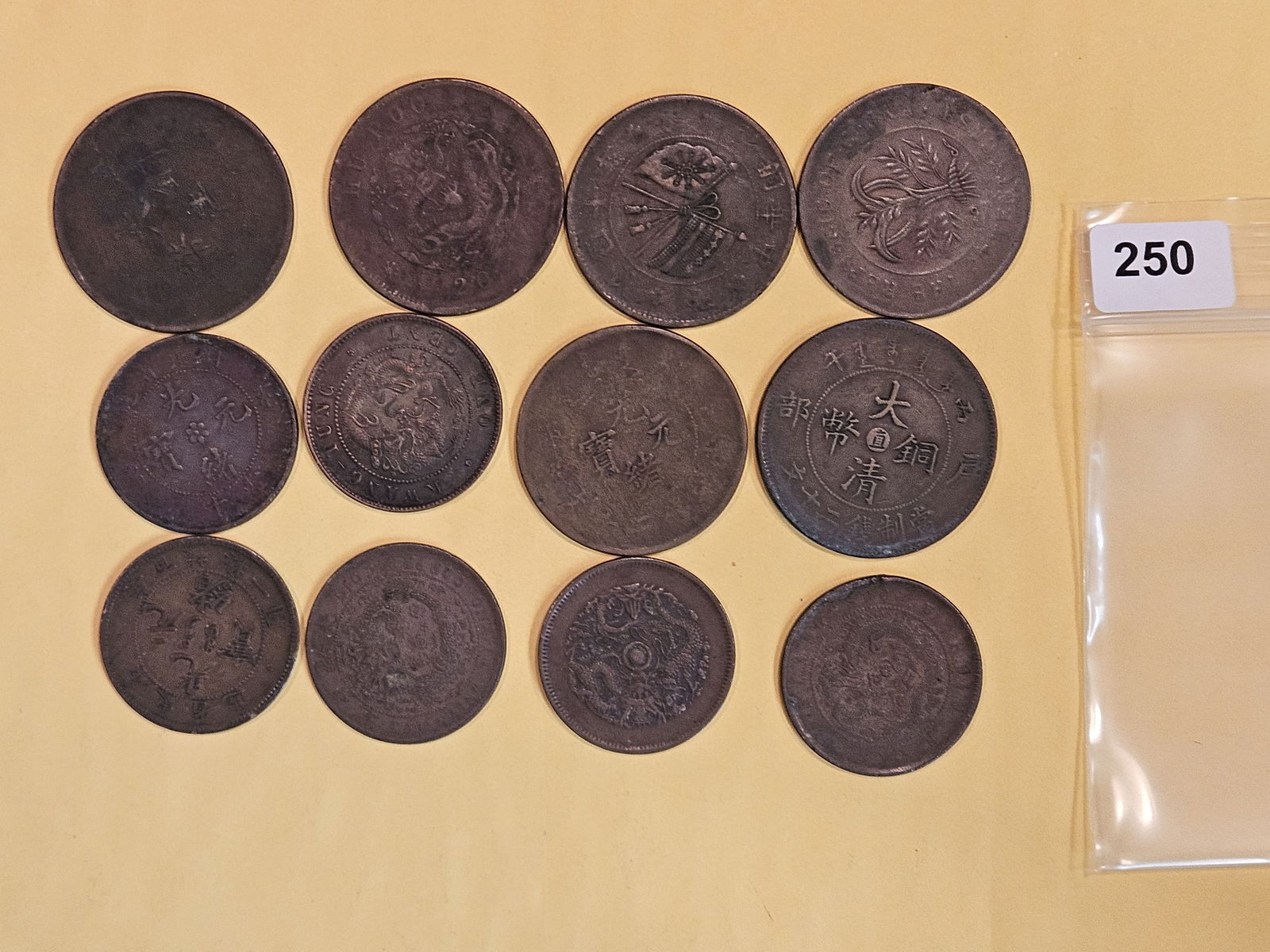 Twelve mixed Chinese Copper coins (1 of 6)