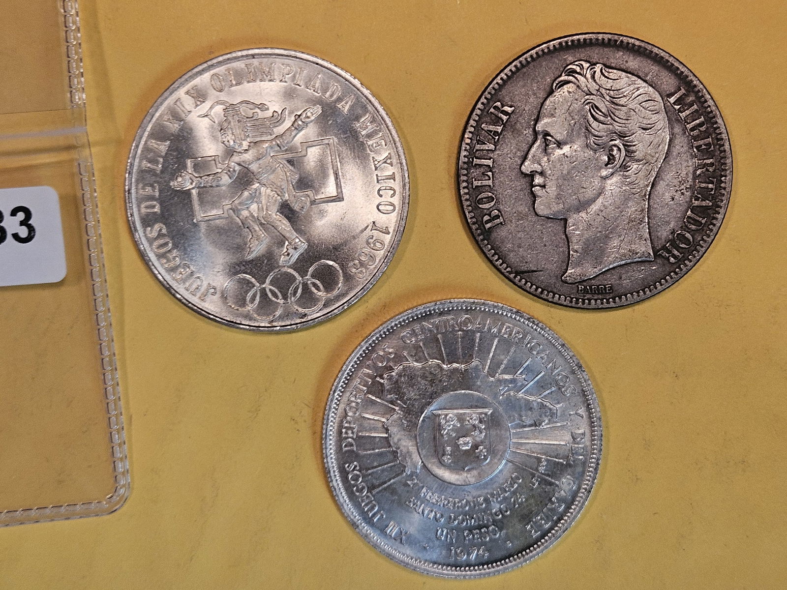 Three larger, mixed Silver World Coins (1 of 3)