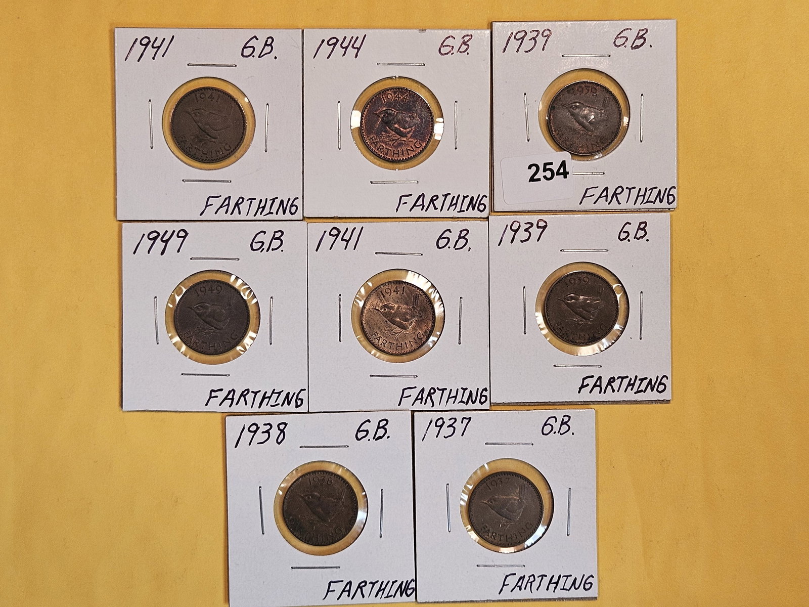 Eight Great Britain farthings (1 of 7)