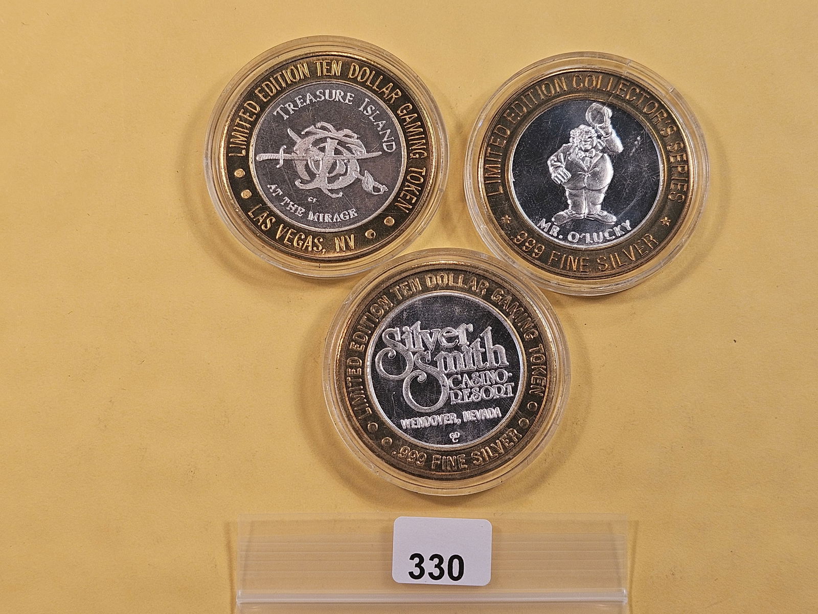 Three Silver Ten Dollar Casino Gaming Tokens (1 of 2)