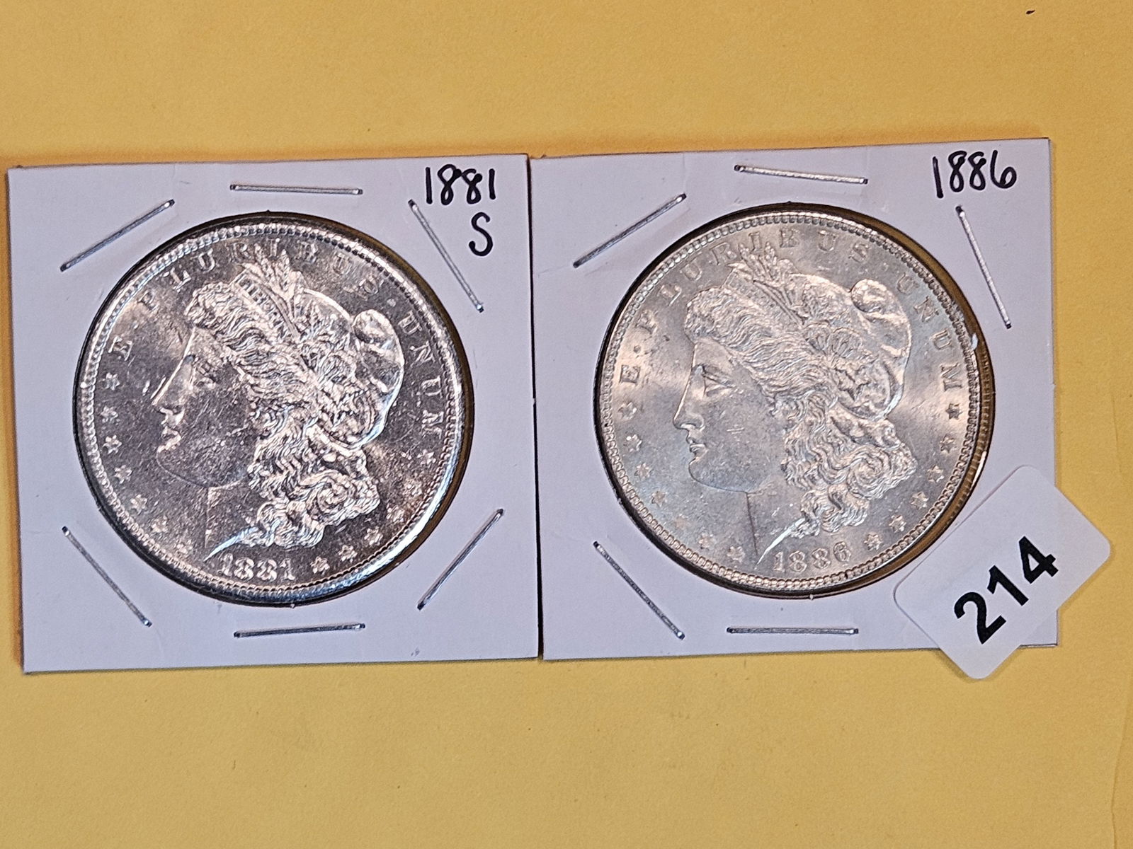 Two Brilliant About Uncirculated plus Morgan Silver Dollars (1 of 3)