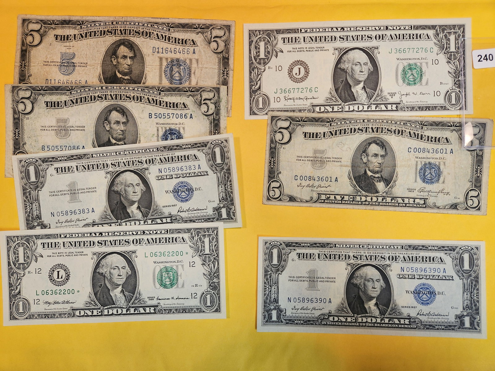 Seven mixed pieces of US Currency (1 of 2)
