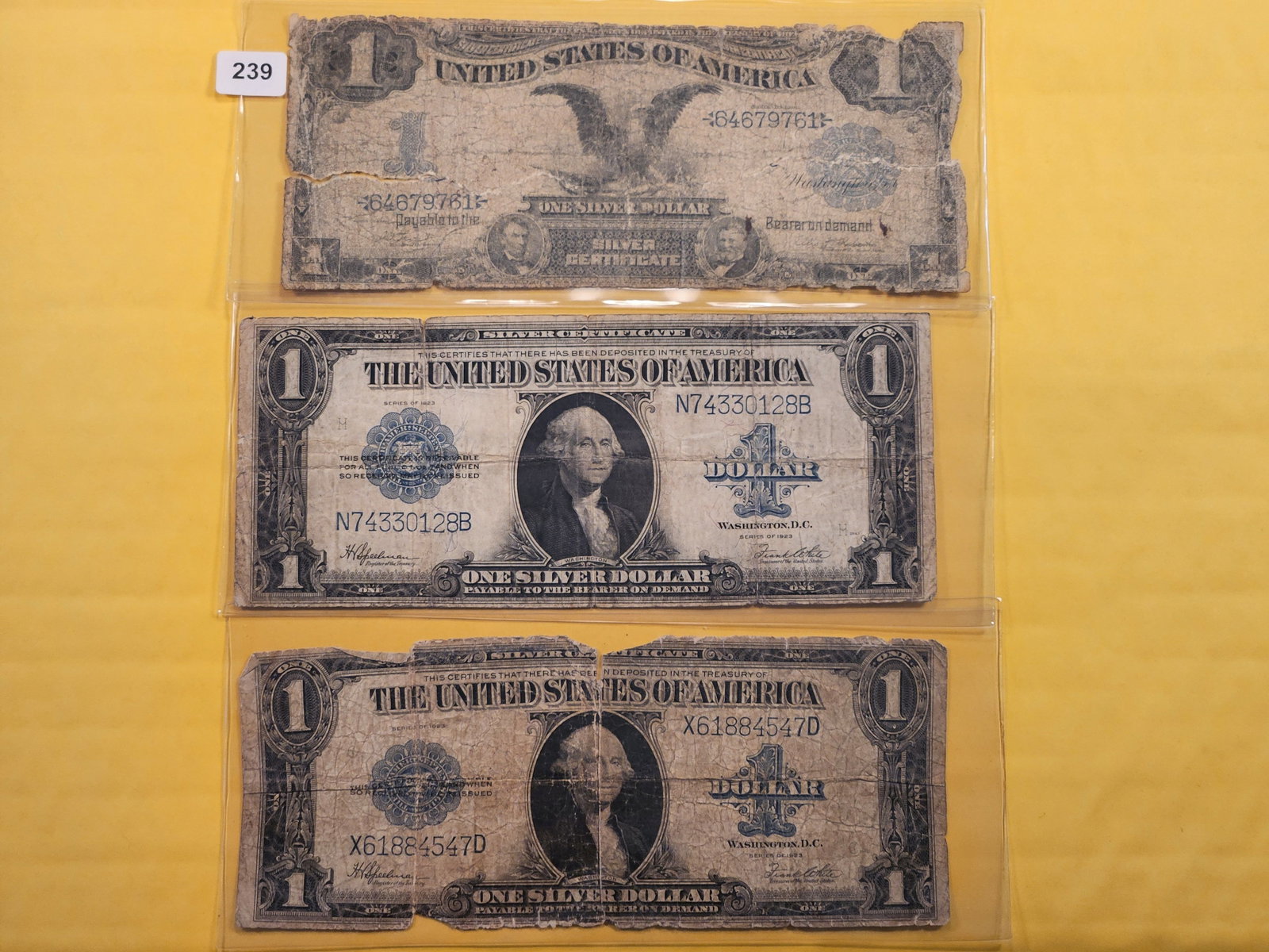 Three Circulated Large Size One Dollar Silver Certificates (1 of 5)