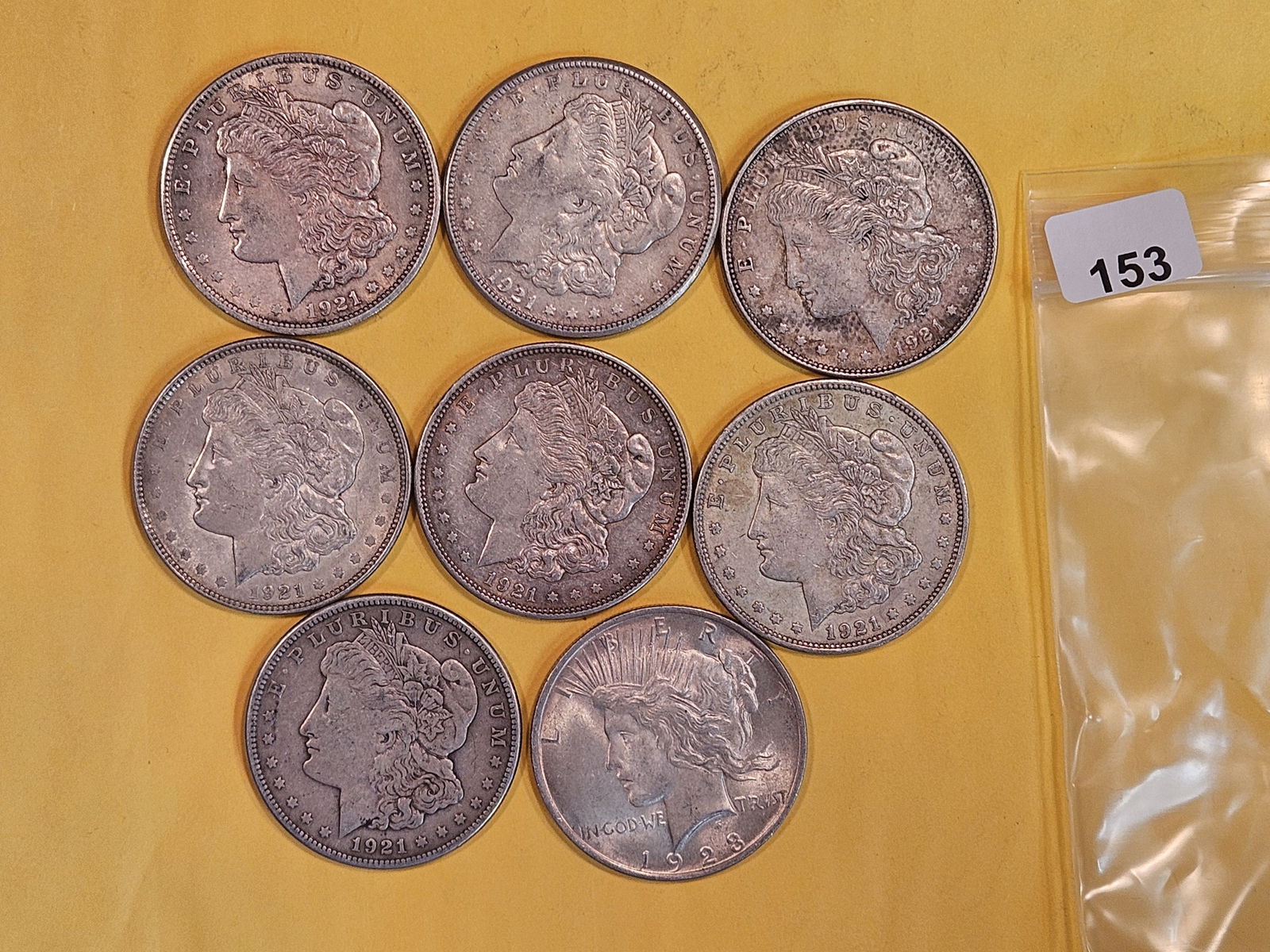 Eight mixed Silver Dollars (1 of 3)