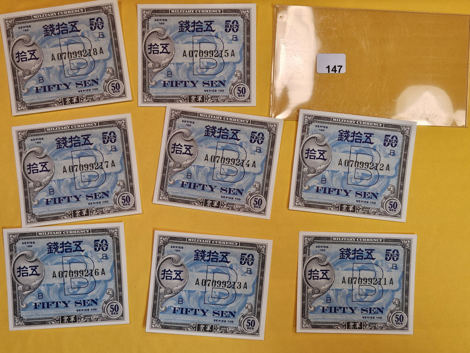 Eight Crisp Uncirculated Consecutive pieces of Military Currency (1 of 2)