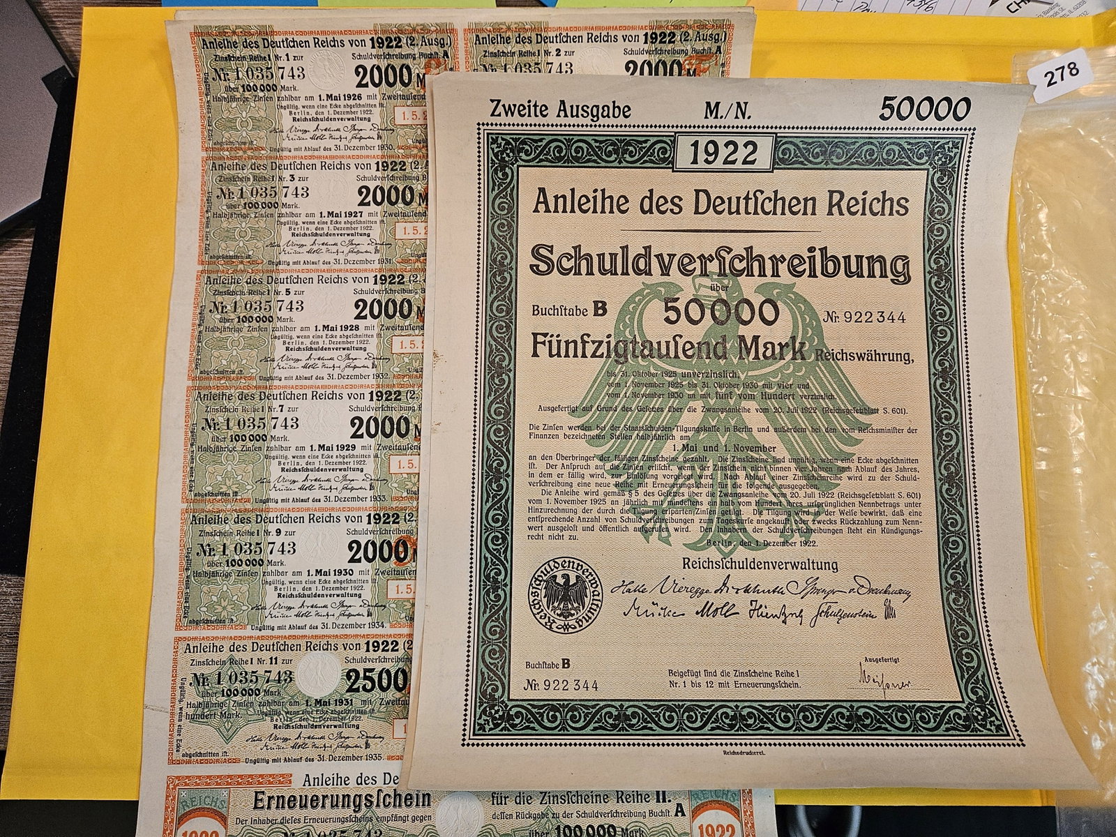 Four Crisp Uncirculated 1922 Germany Bond and Coupon sheets: Two 50k, two 100k. All matching
