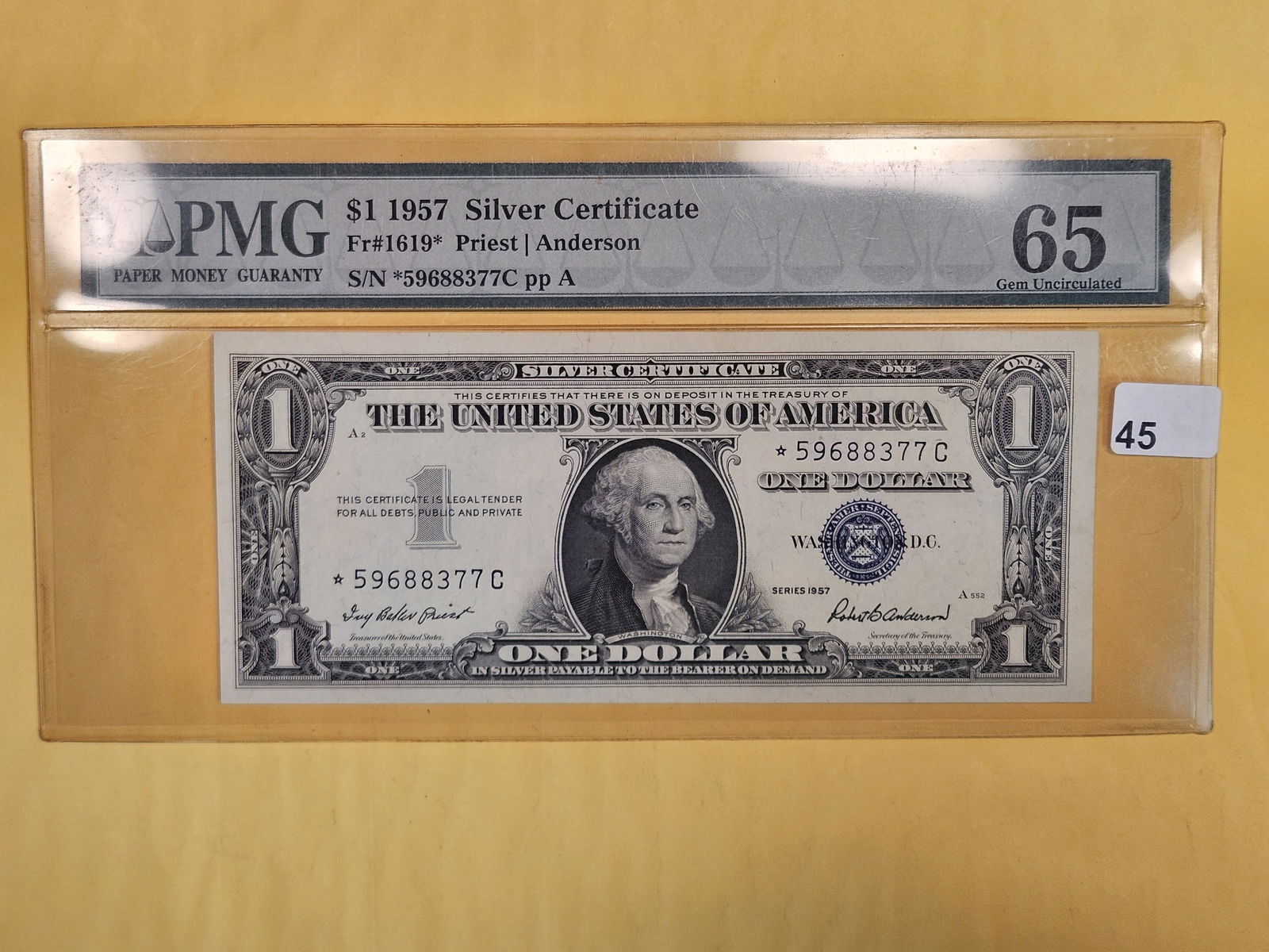 PMG 1957 One Dollar Silver Certificate STAR in GEM 65 Uncirculated (1 of 4)
