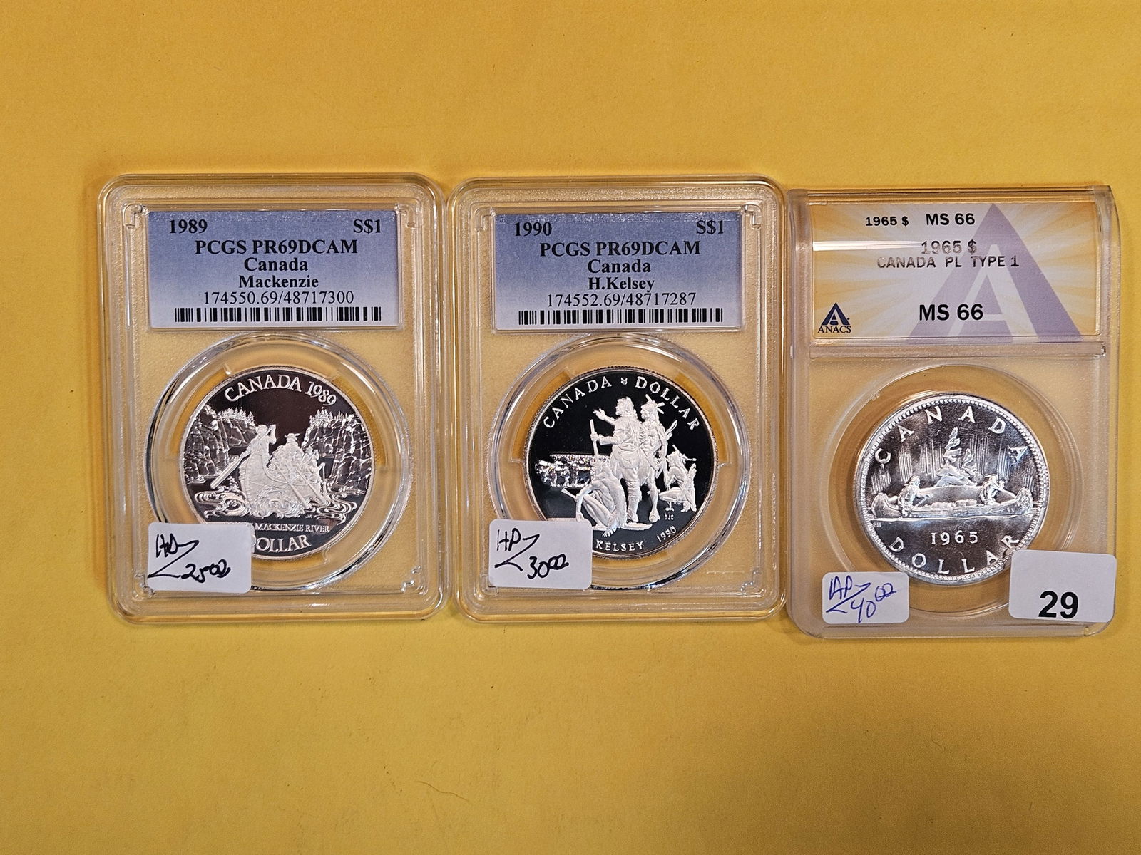 Three ANACS and PCGS-Graded Canada Silver Dollars (1 of 2)