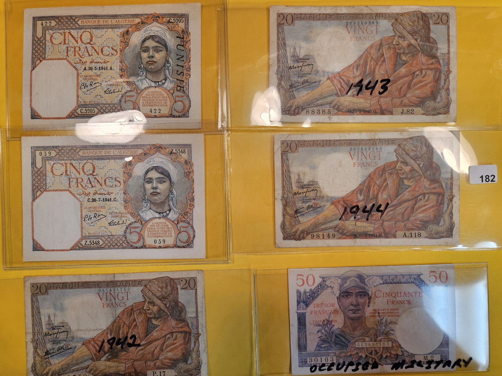 Six pieces of occupied military currency: Algeria and France